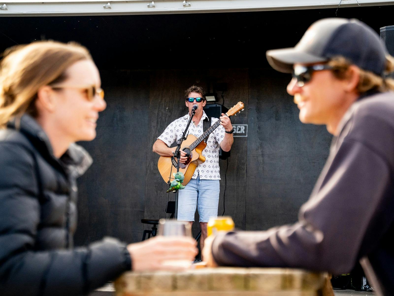 Musician performing in the Yard at Easy Tiger, St Helens.