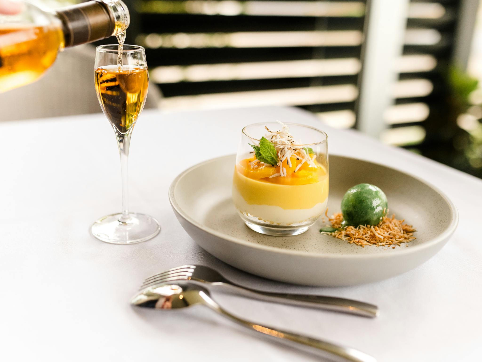 Beautifully presented mango, lime and coconut dish served with local muscat.