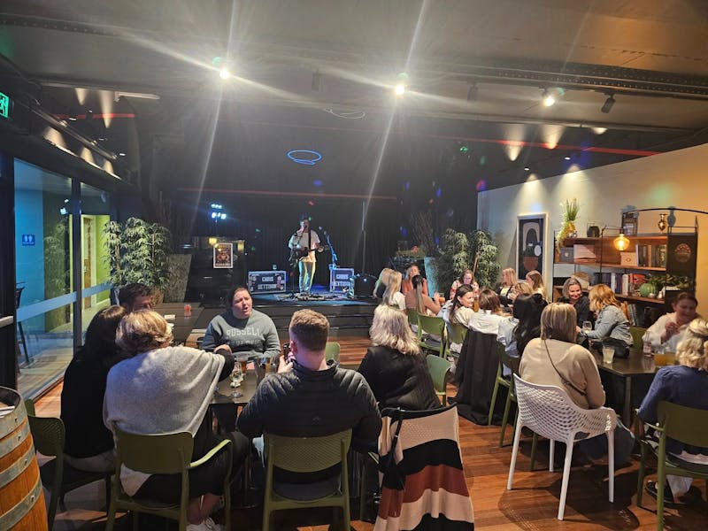Guests enjoying live music at Club Forbes