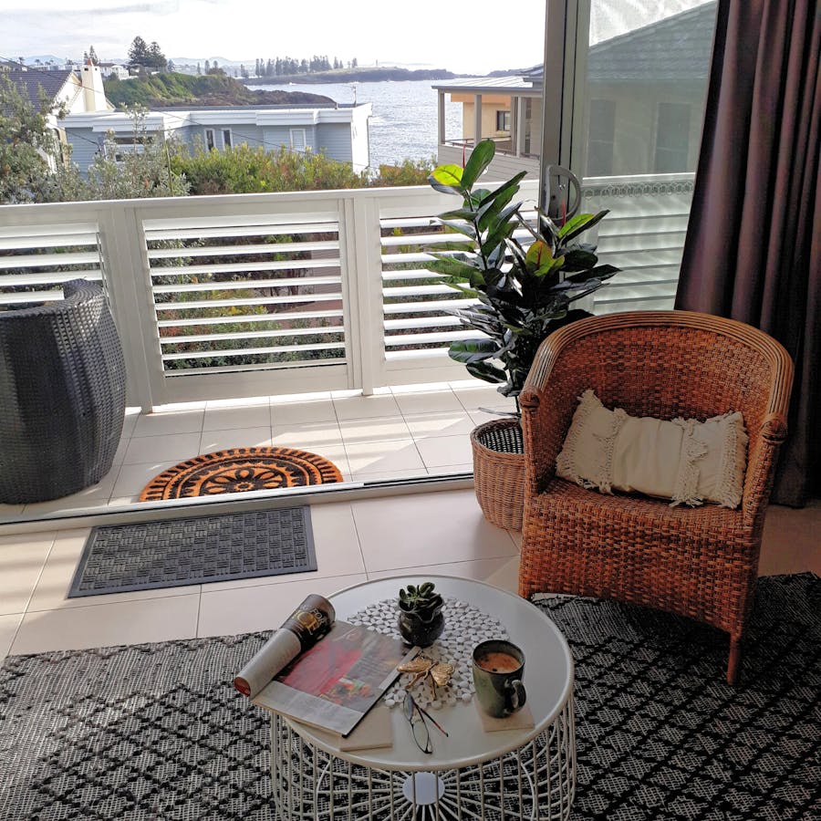Cane chair and coffee table and balcony