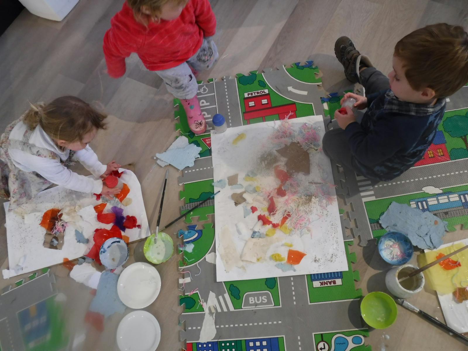 Arial view of children working on the floor in the Creative Space