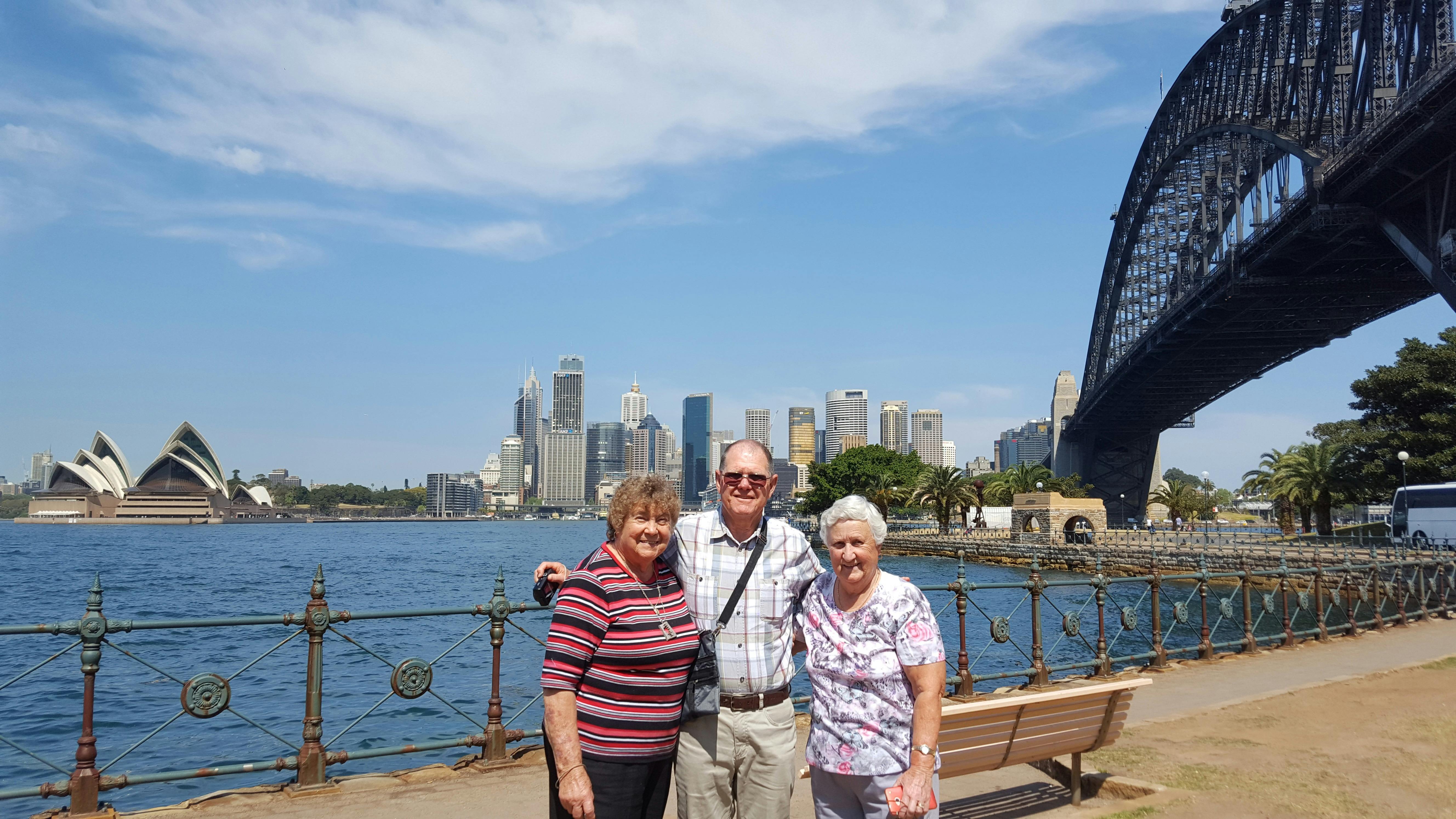 3 people standing at Sydney Harbour