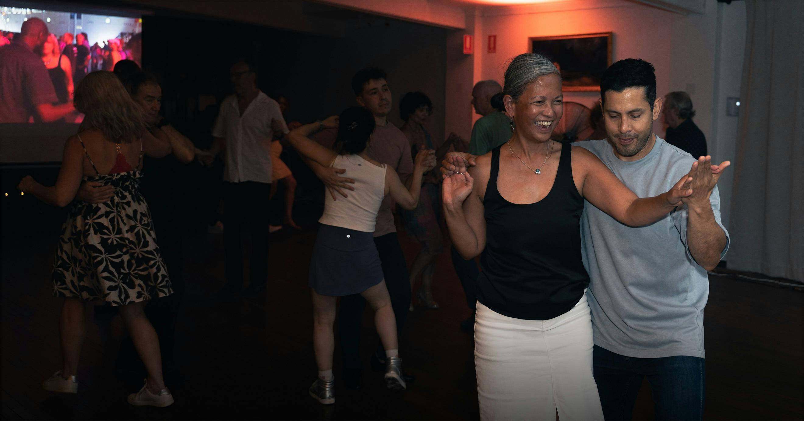 People doing latin dance together