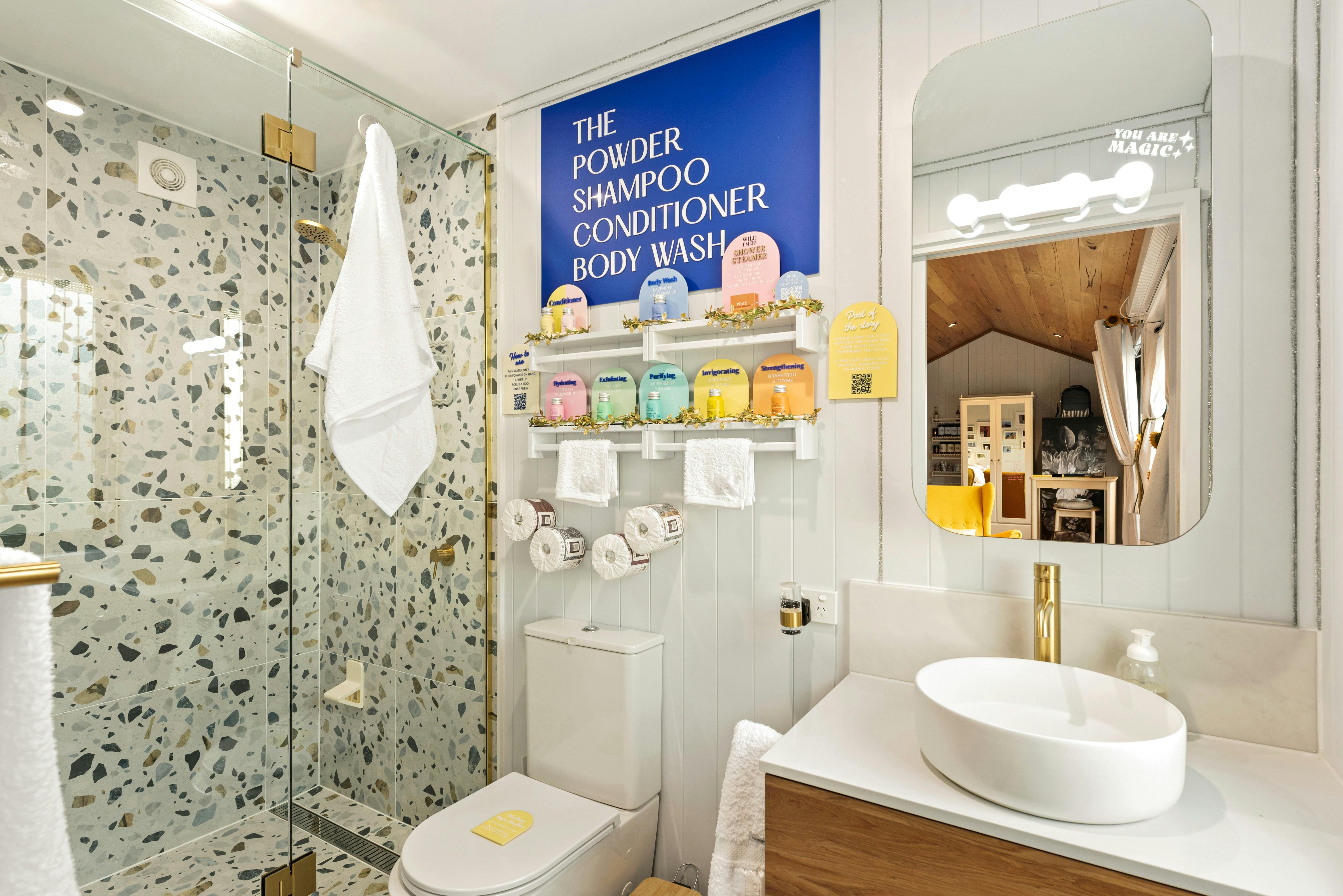 Interior of Eirian bathroom showing shower, toilet and basin