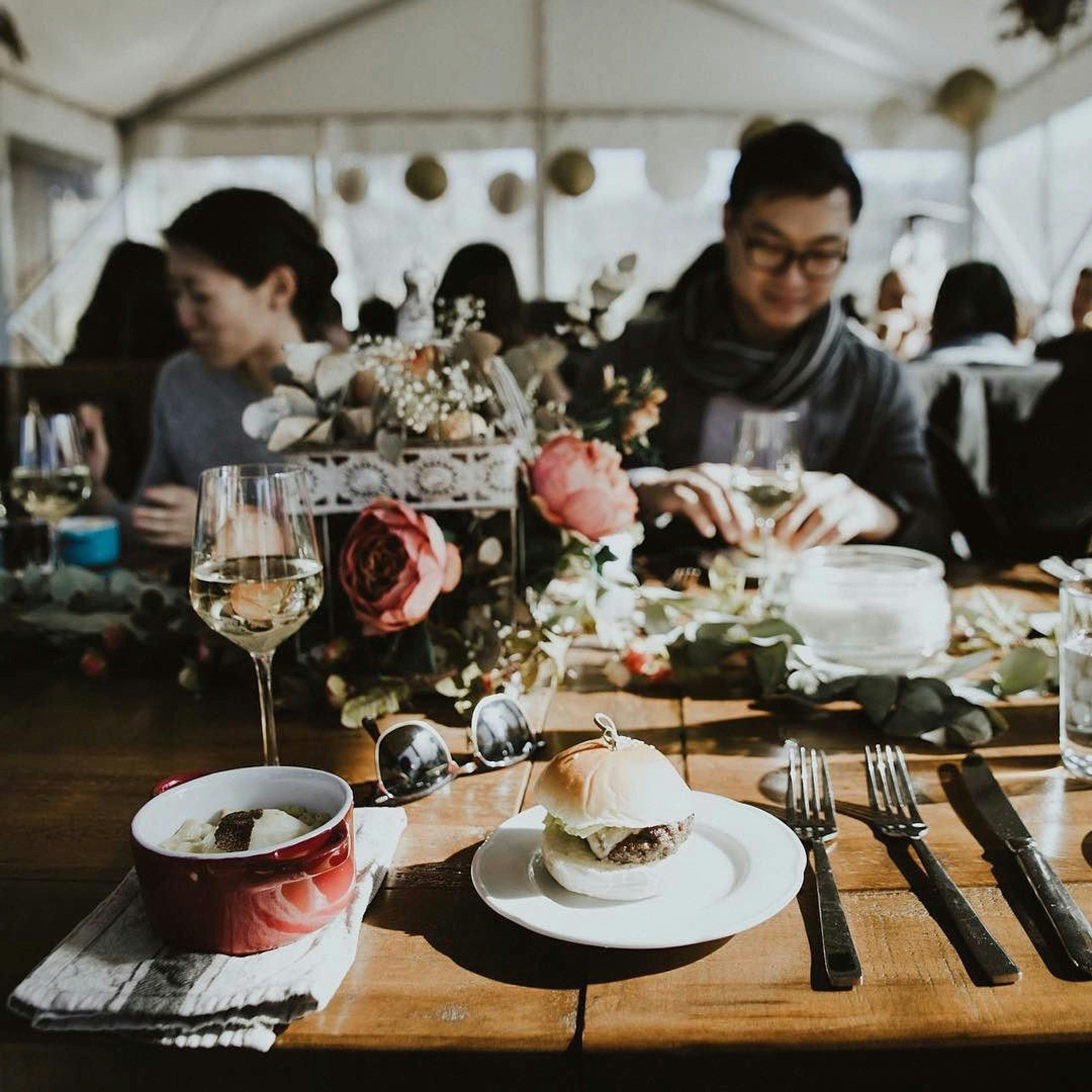 Table set with flowers and truffle dishes