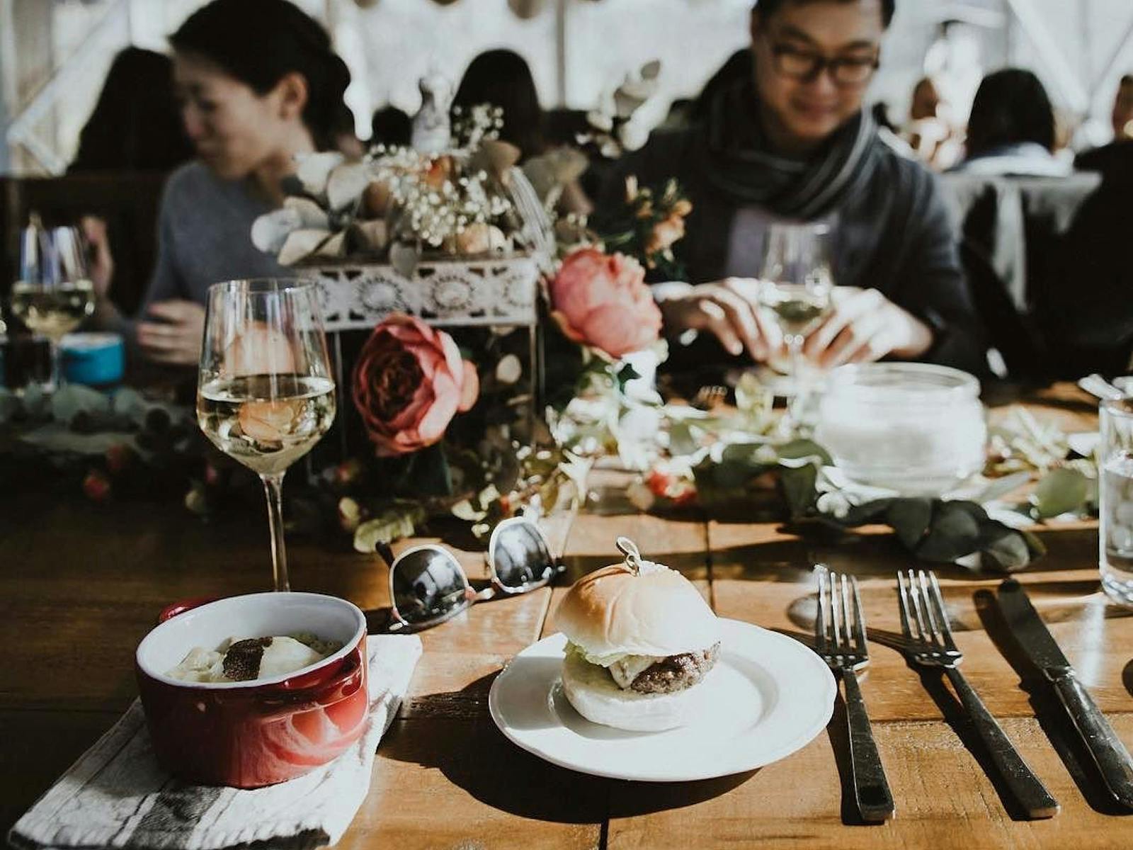 Table set with flowers and truffle dishes