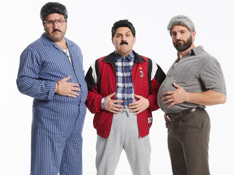 Three men dressed old, posing