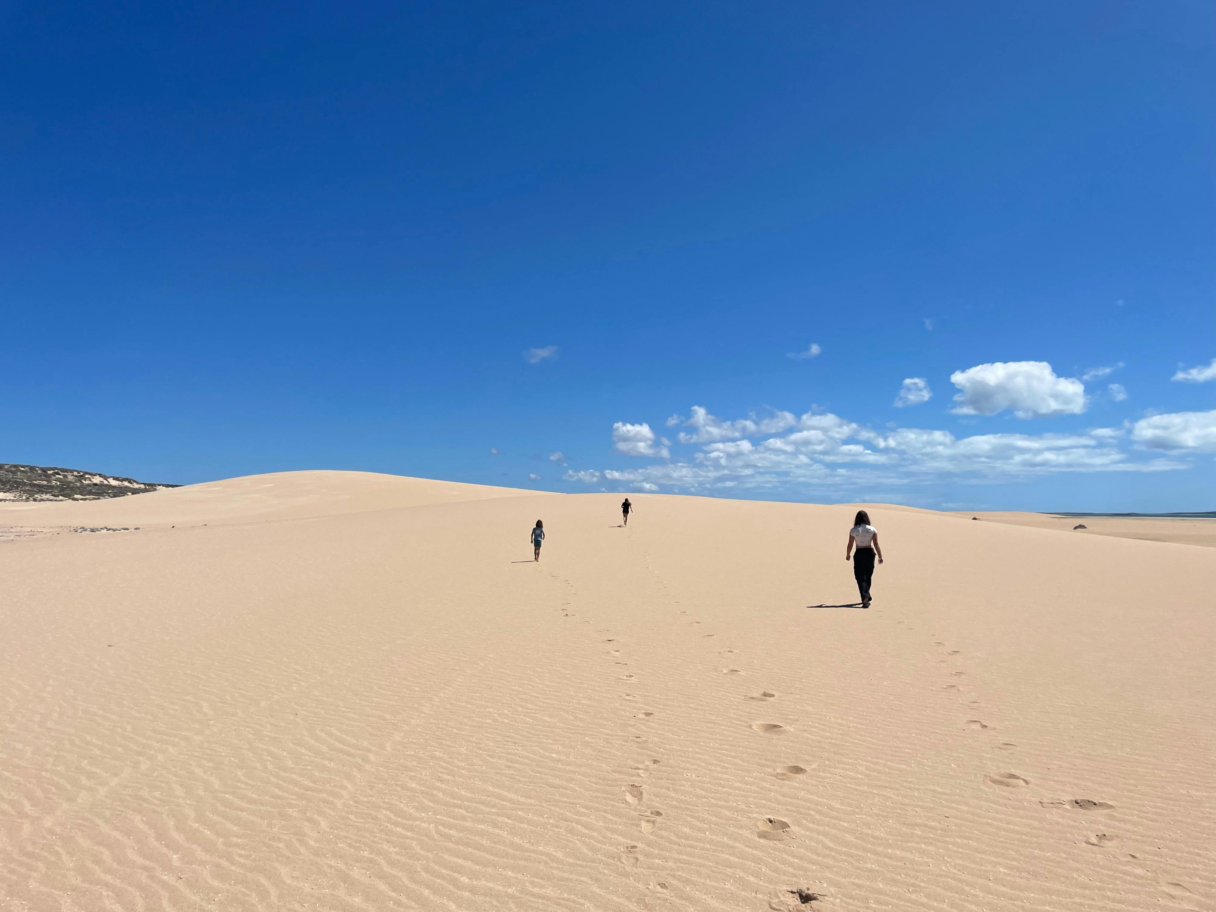 Kids exploring sand dunes on Dirk Hartog Island