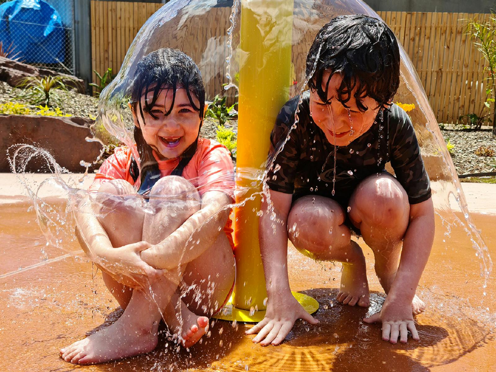 Two children enjoying themselves at the Benalla Splash Park