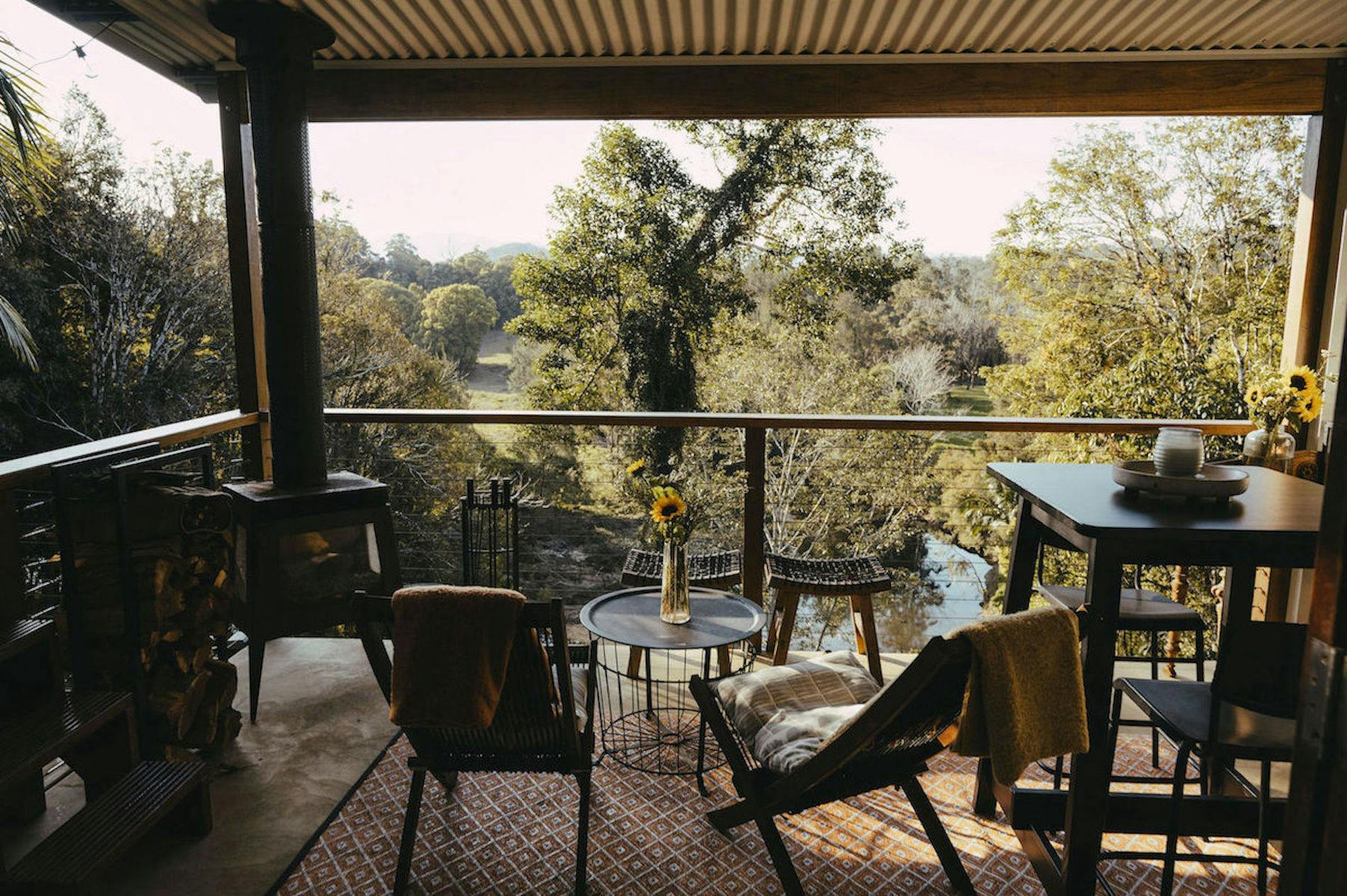 Tallowwood Cabin Verendah with Outdoor Fireplace, Sitting Area and Outlook