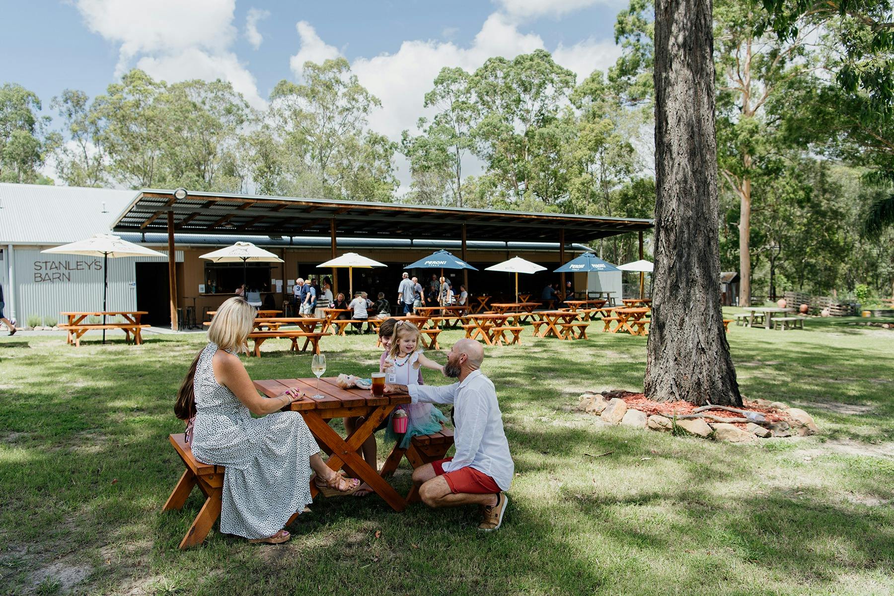 Family enjoys drinks and lunch at Stanleys Barn at the Gold Coast Motor Museum
