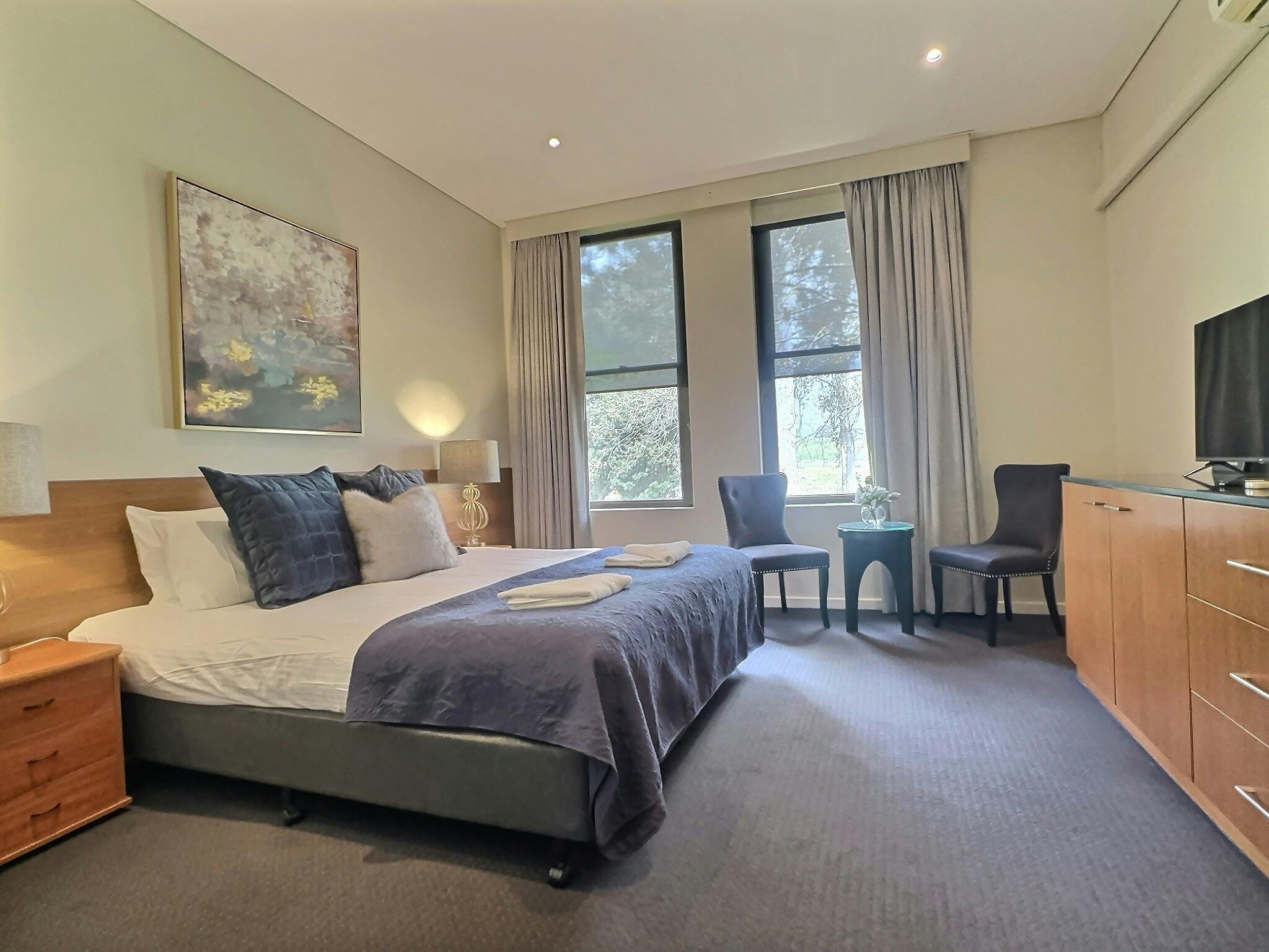 King Room with sitting area and television