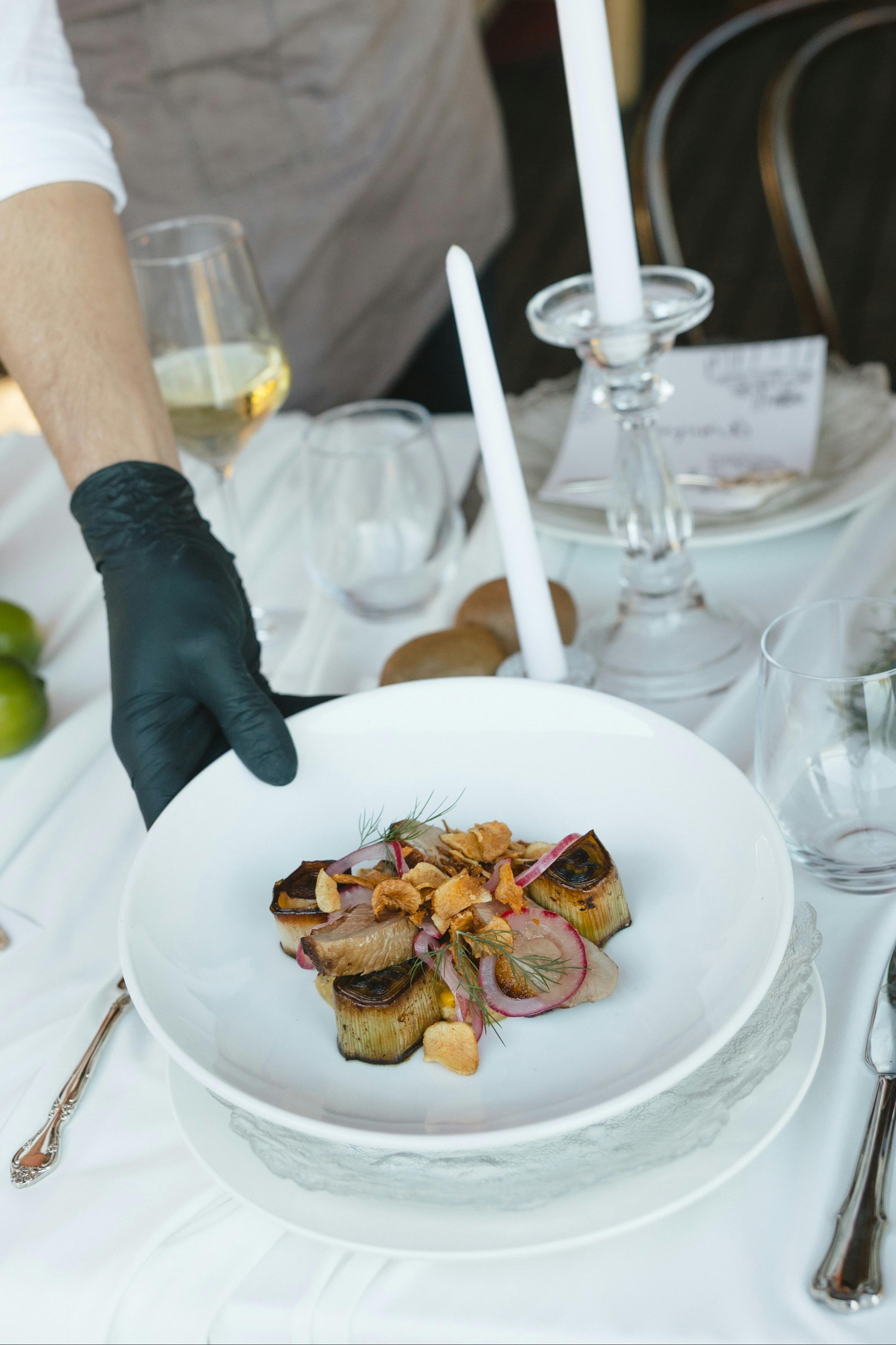 Roasted Duck Breast, creamed corn, grilled leek, pickled onions, chives & artichoke crisps