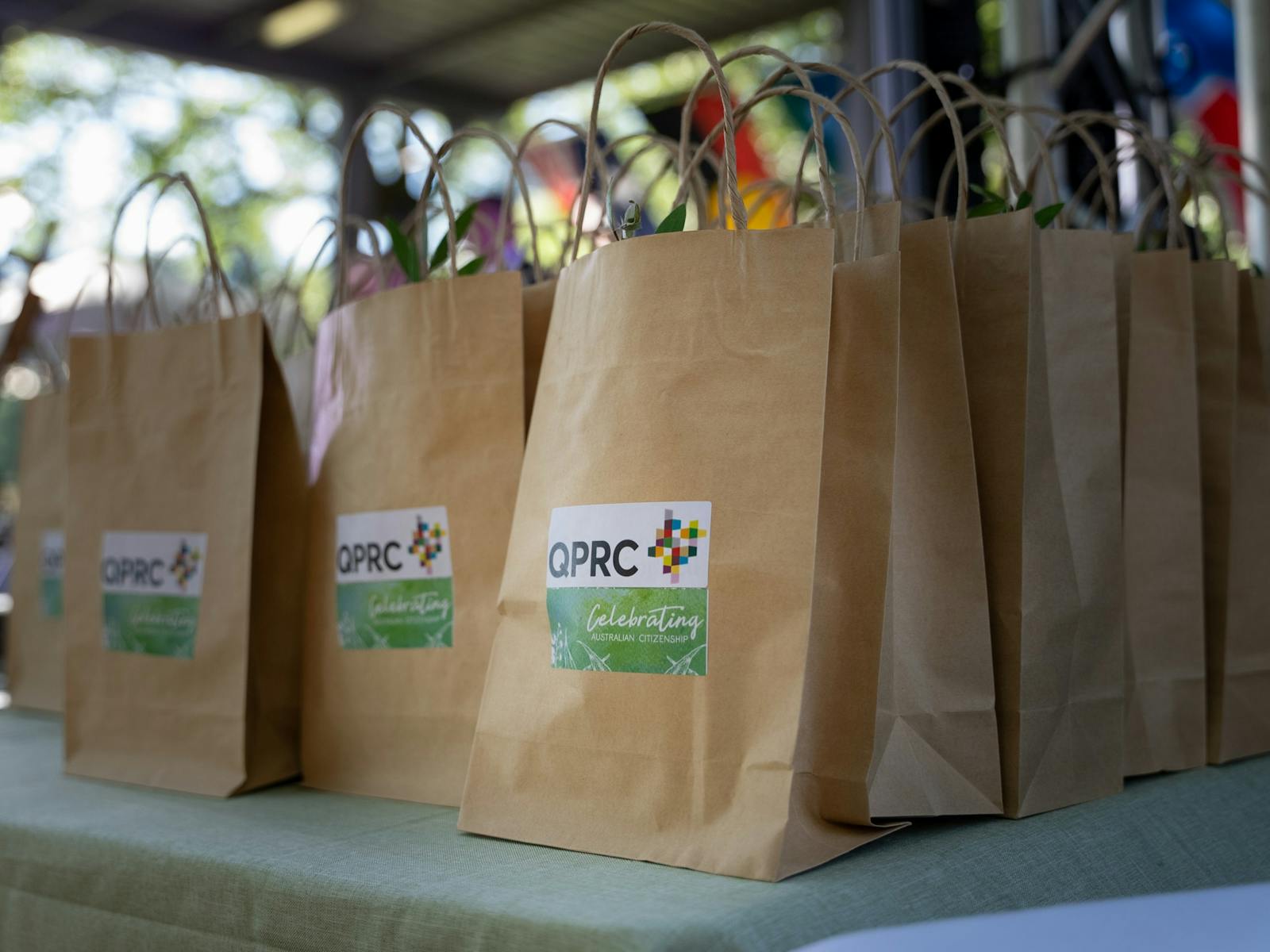 QPRC citizenship packs on a table