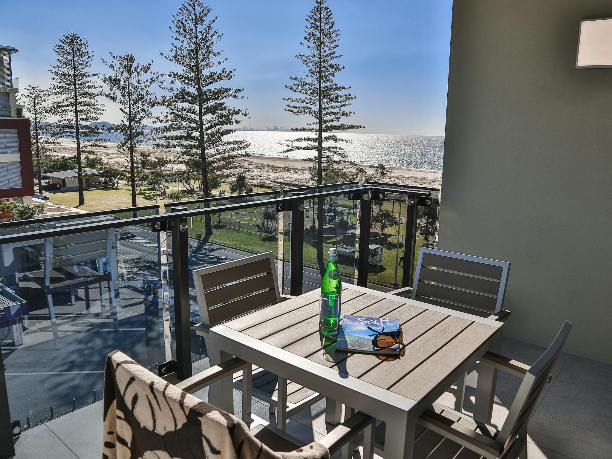 Outdoor seating on your private balcony with ocean views Outdoor seating on your private balcony with ocean views