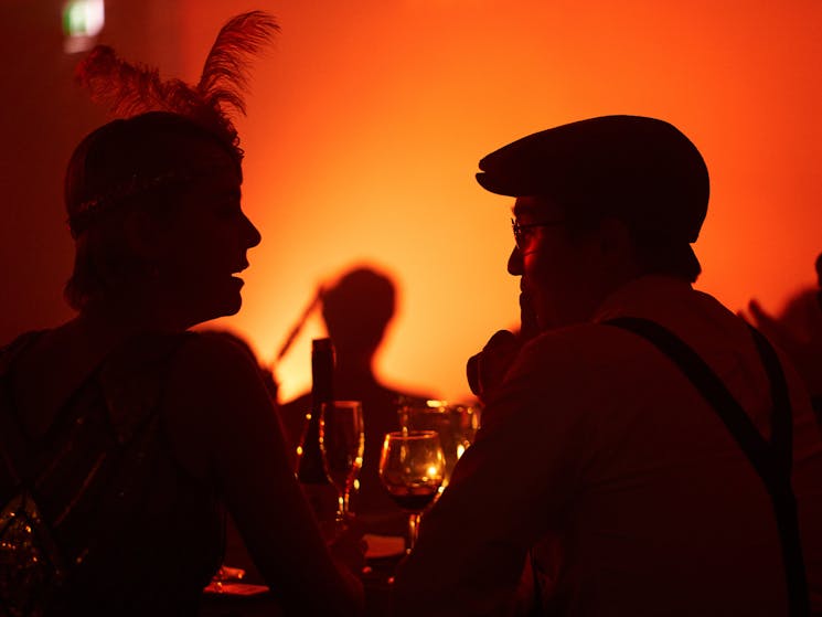 Romantic couple dinner date ideas Sydney. Vintage dressed couple at old fashioned dinner show