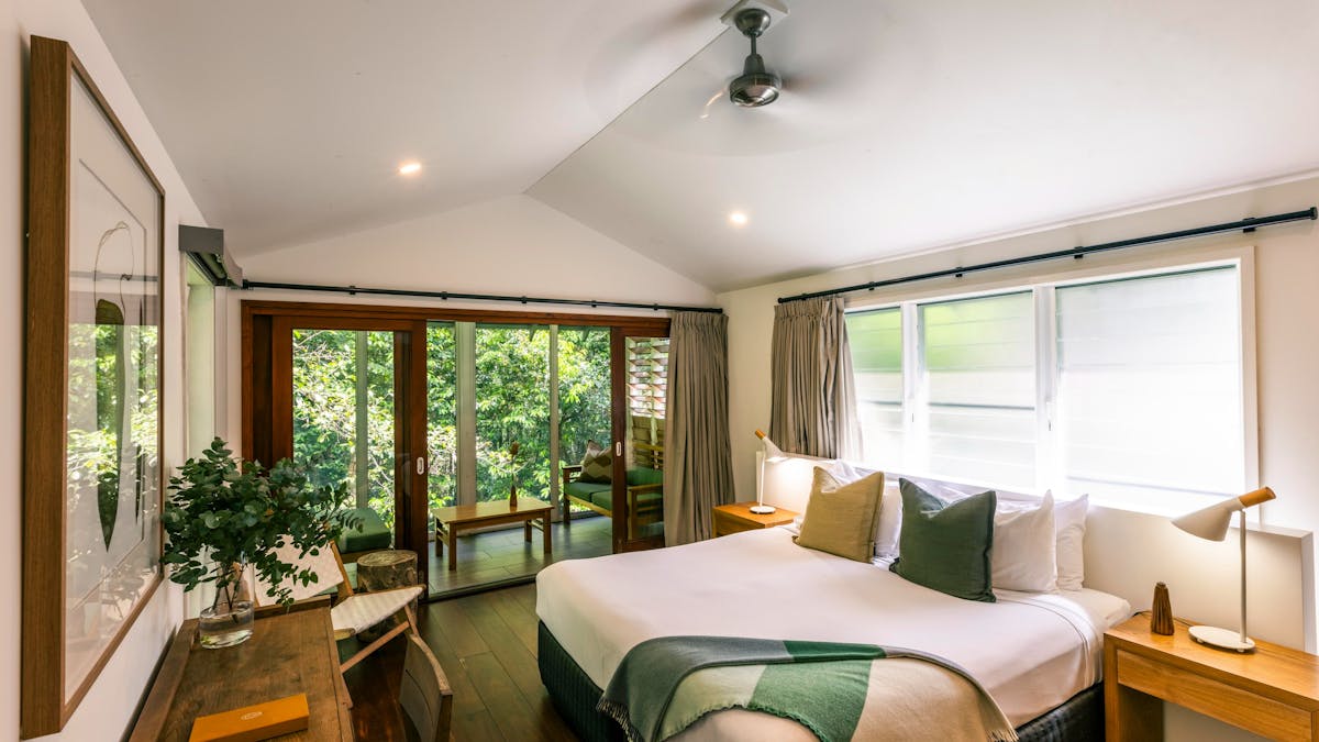 Daintree Ecolodge Canopy Treehouse interior with king bed and private balcony