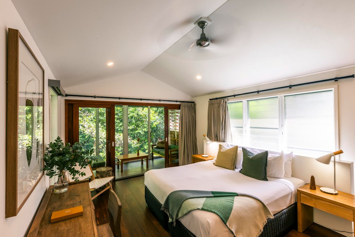 Daintree Ecolodge Canopy Treehouse interior with king bed and private balcony
