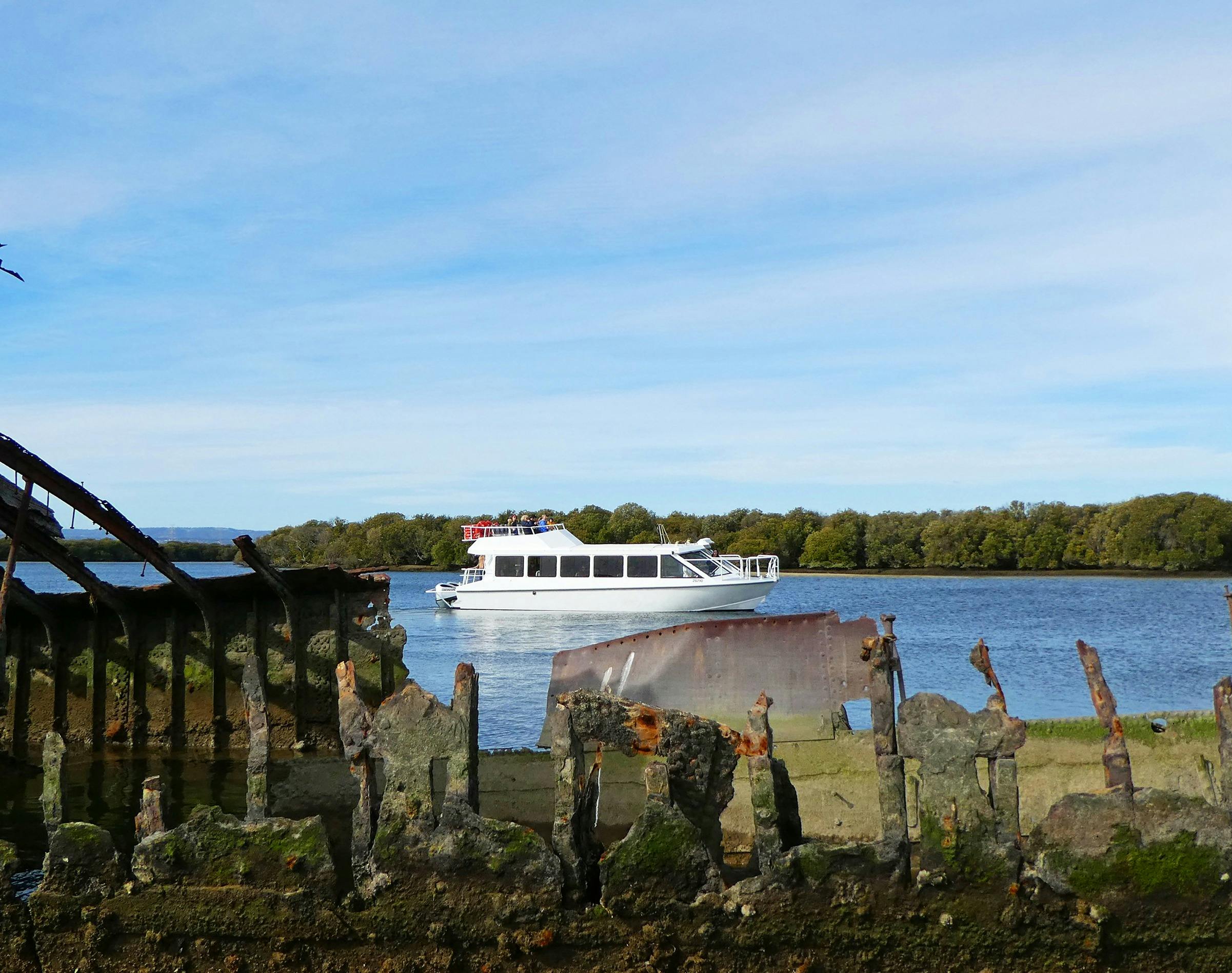 The PRC 32-Seater cruises along by a shipwreck