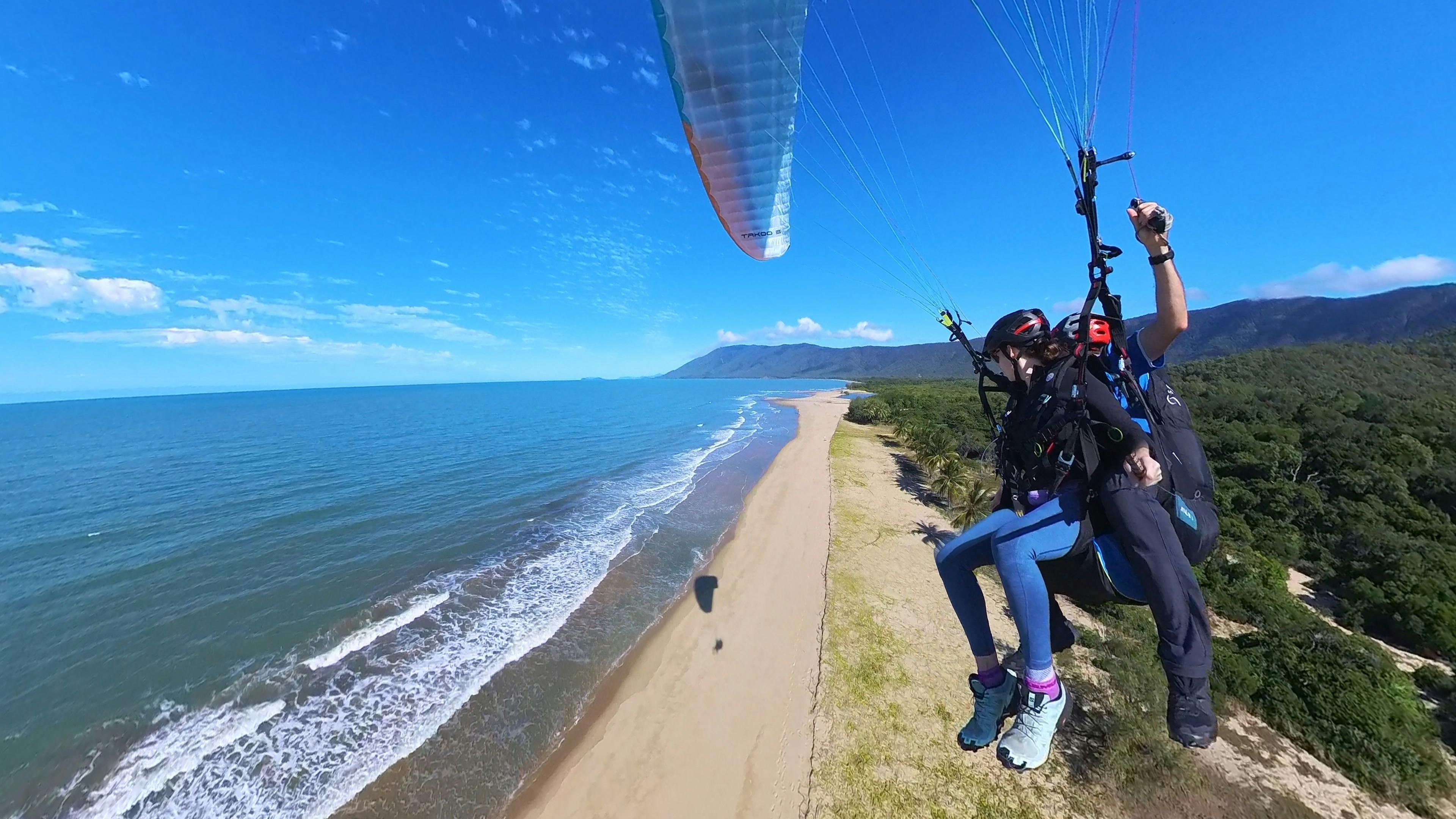 tandem paragliding along the coast