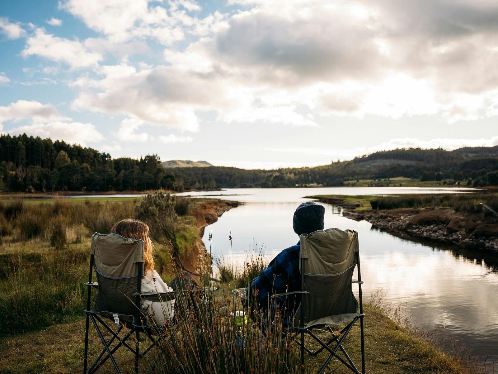 Couple watching the sunset over Lake Gairdner