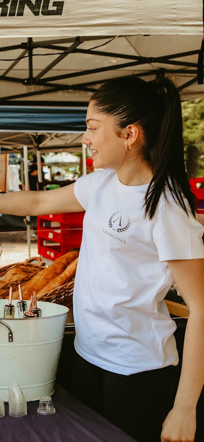 A visitor tasting a sample of vodka from Ambrosia Distillery