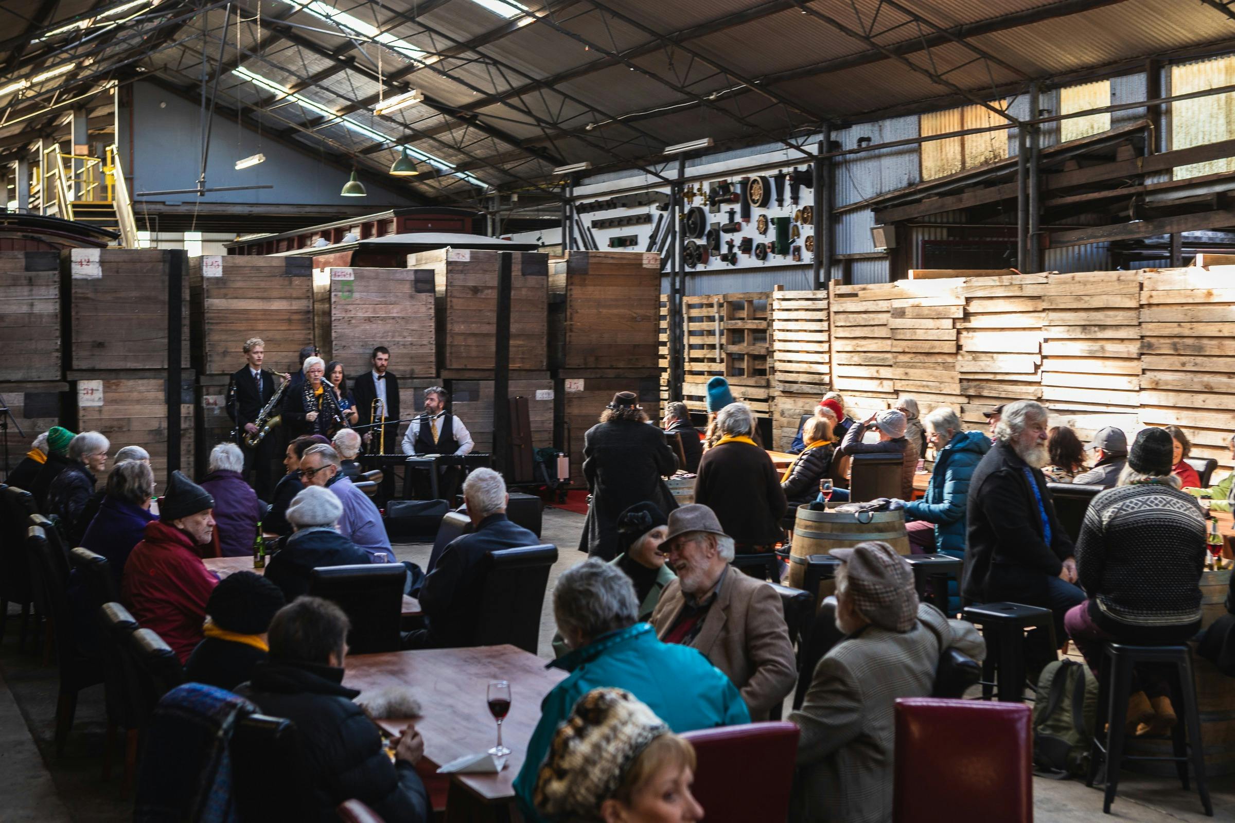 seated audience listening to band