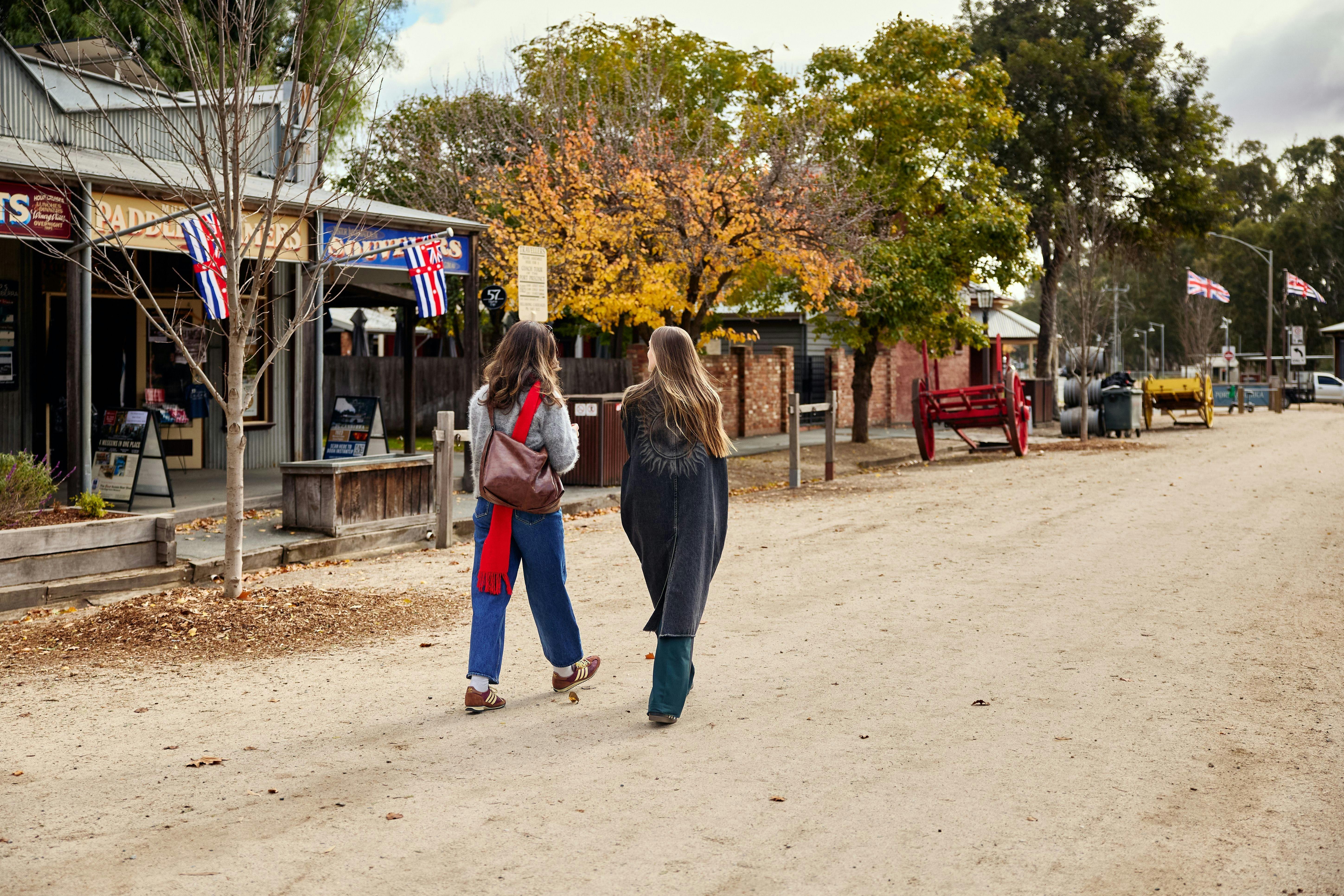Image of two ladies walking along the Port of Echuca