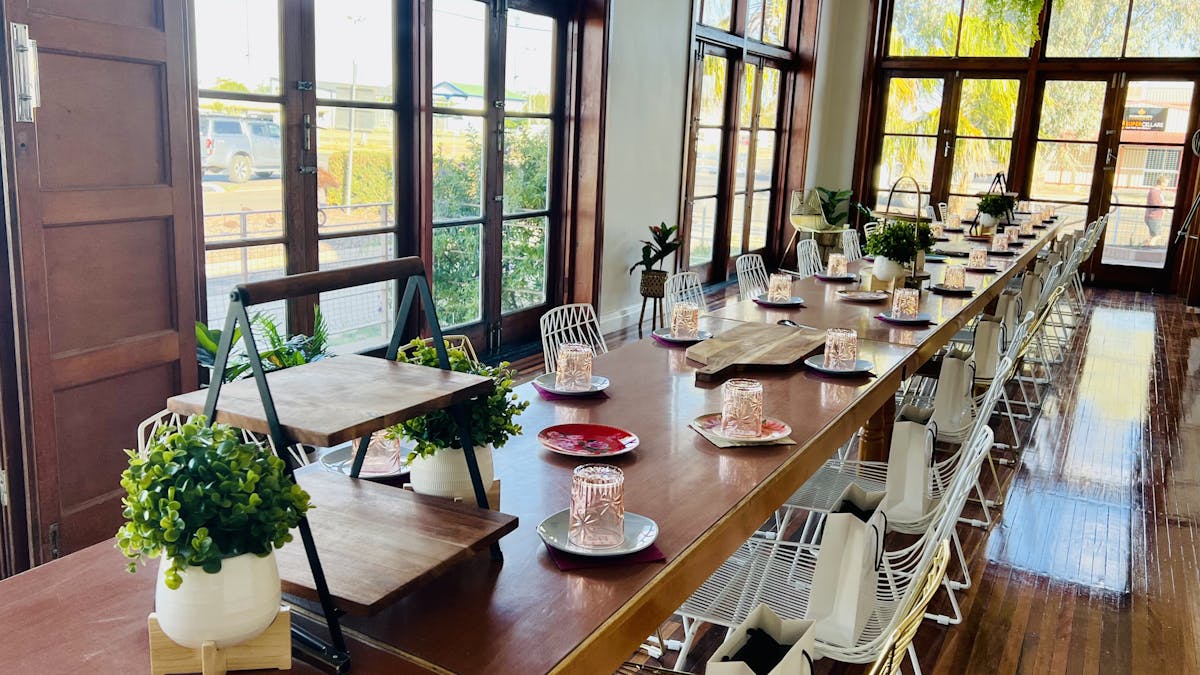 Event space set up for High Tea with polish floors, large feature windows at the Retreat Cunnamulla
