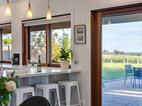 View out to the vineyard from Simon Tolley Lodge's kitchen/dining area