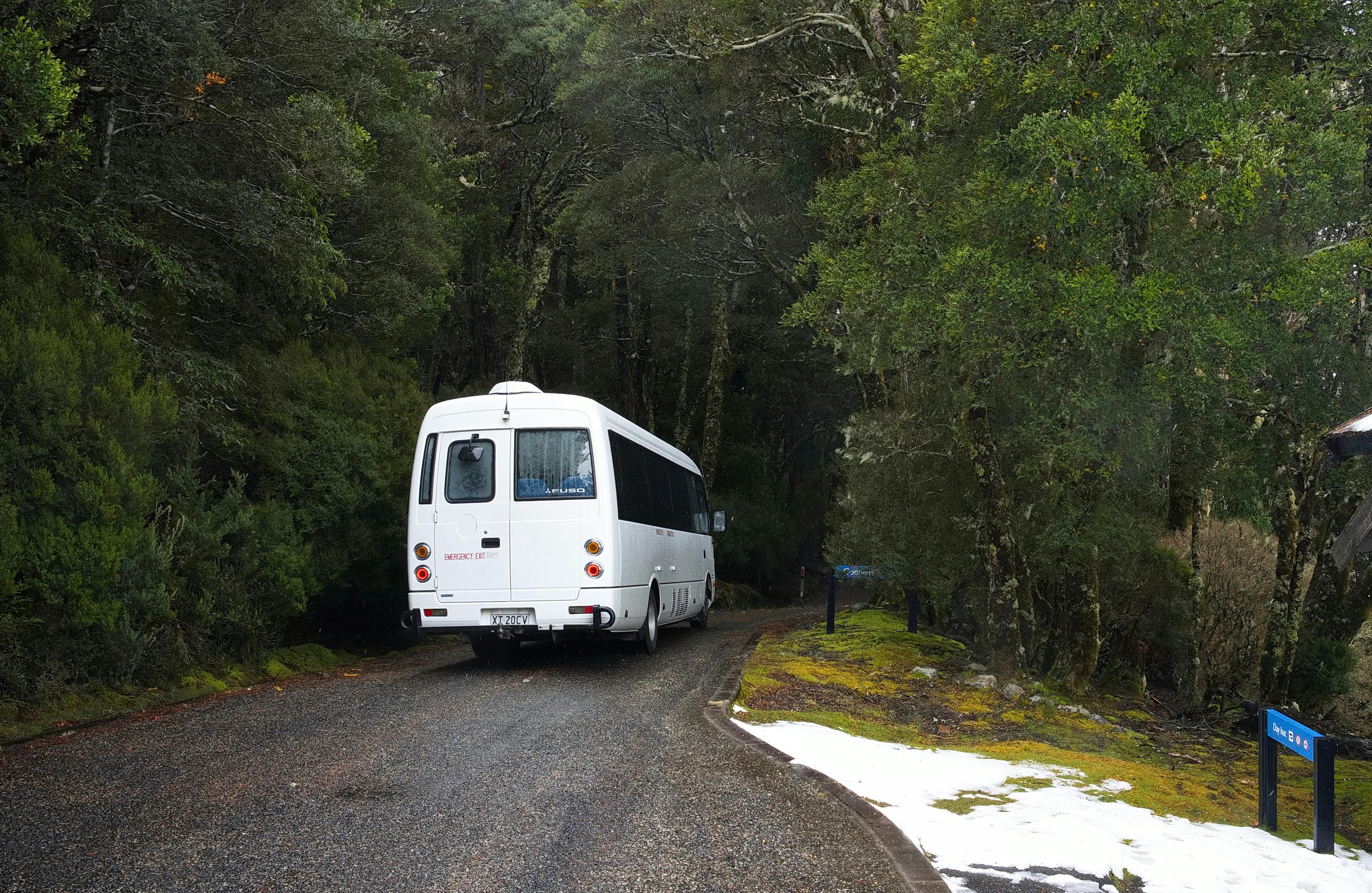 Small coach leaving Cradle Mountain National Park