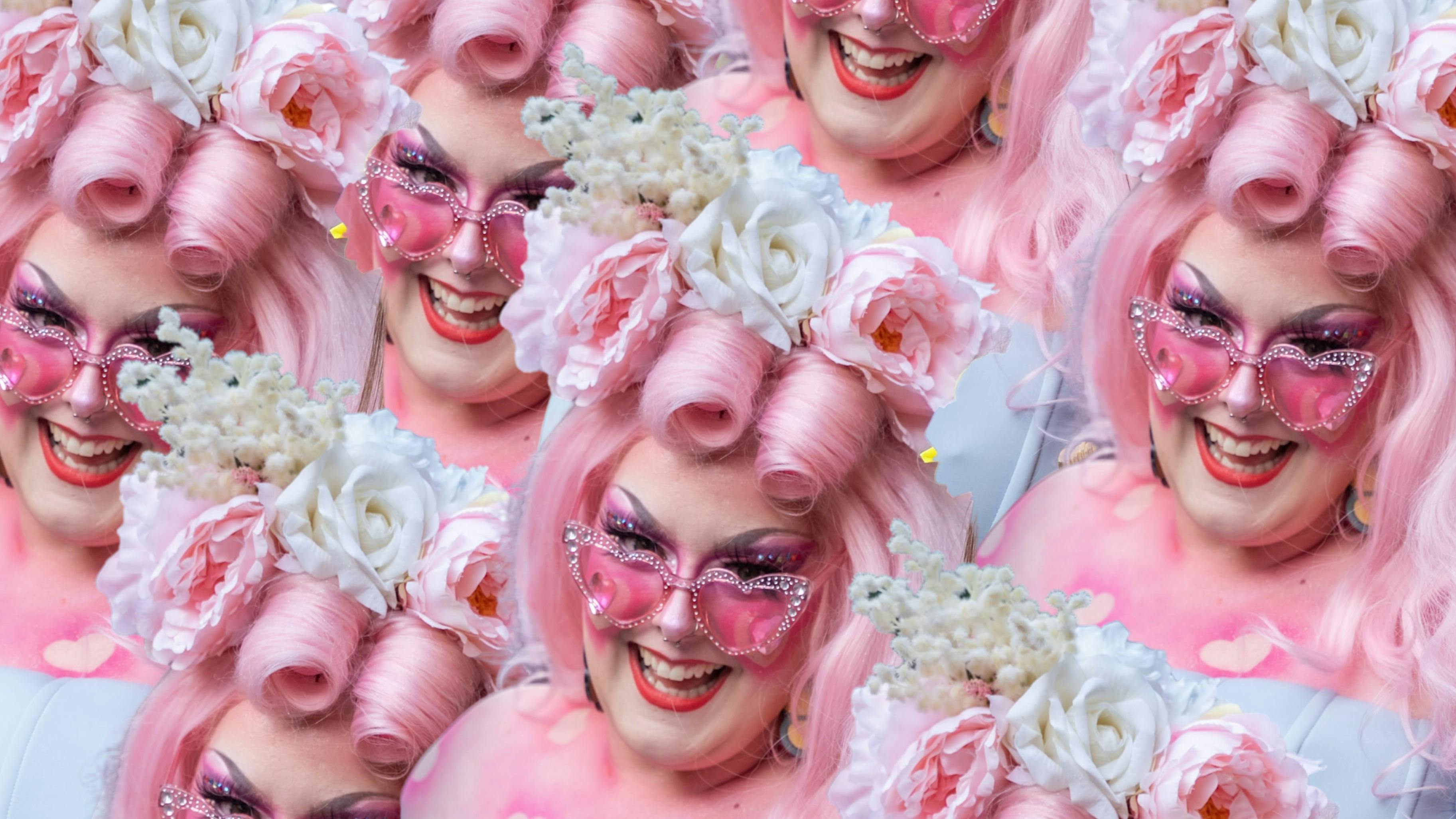 Repeated Alice Terry faces. She's wearing a huge pink wig, with pink heart glasses & she's fabulous!