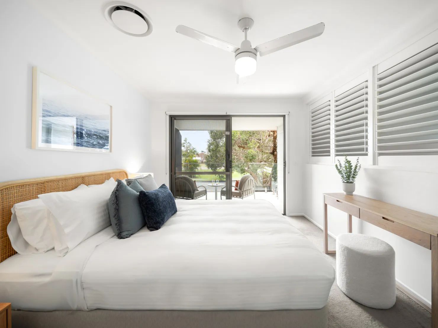 Queen bedroom with balcony access