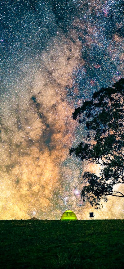 Astrophotographer under the Milky Way Core
