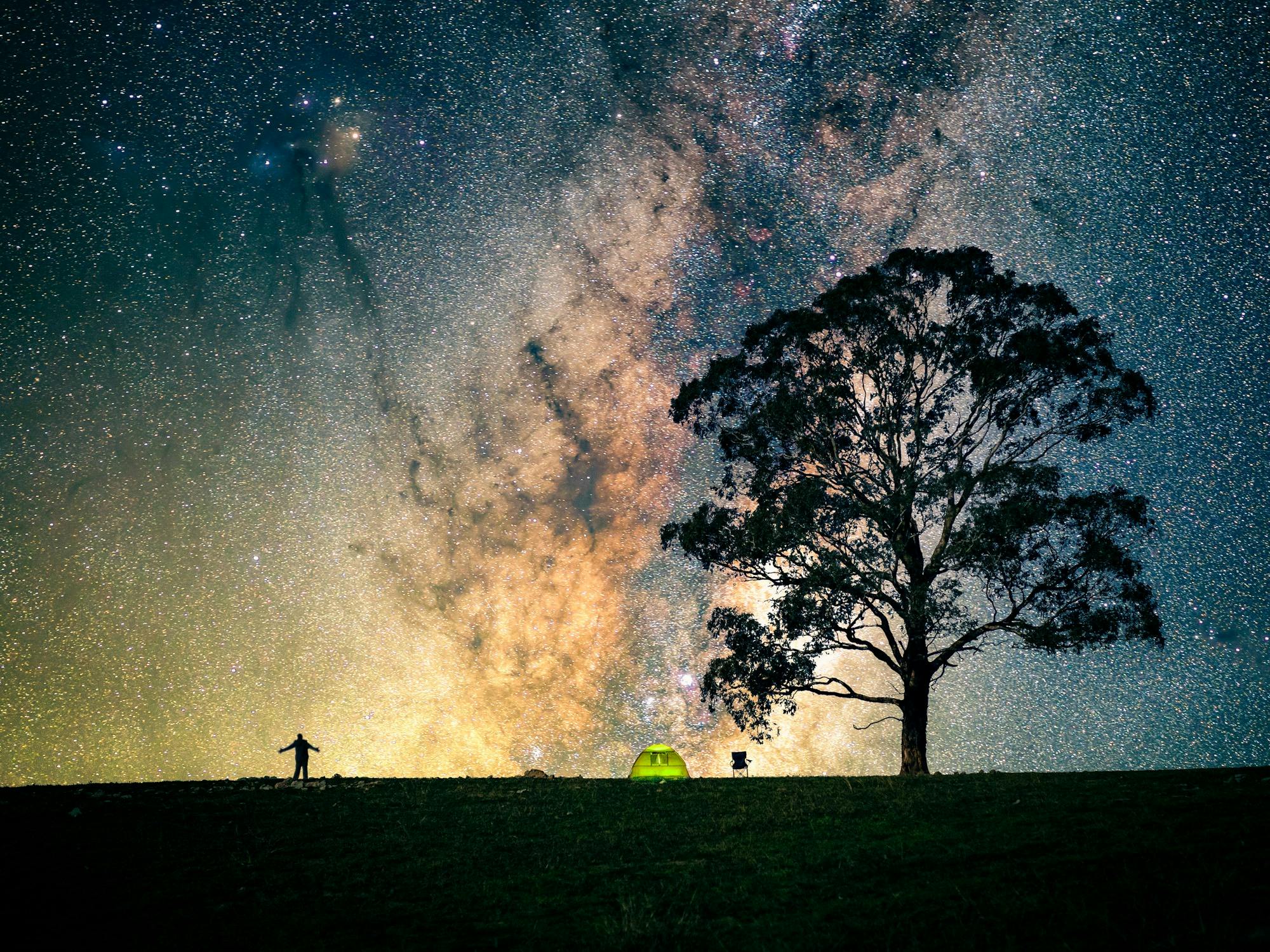 Astrophotographer under the Milky Way Core