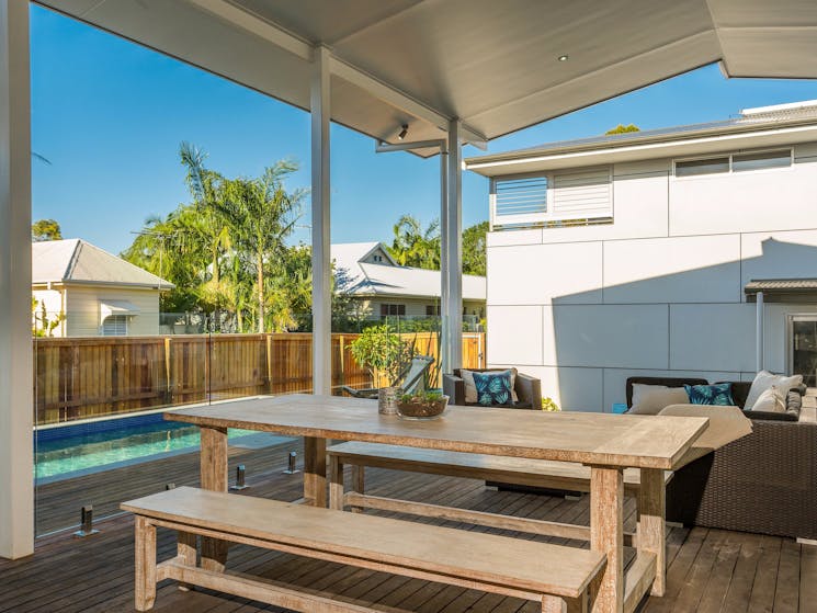 Aditi -  outside back deck area by the pool