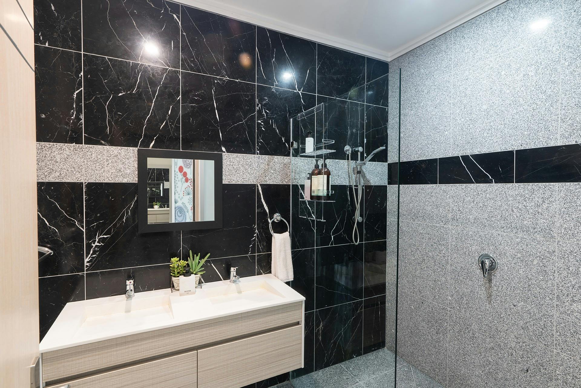 Walk in shower with vanity and separate toilet