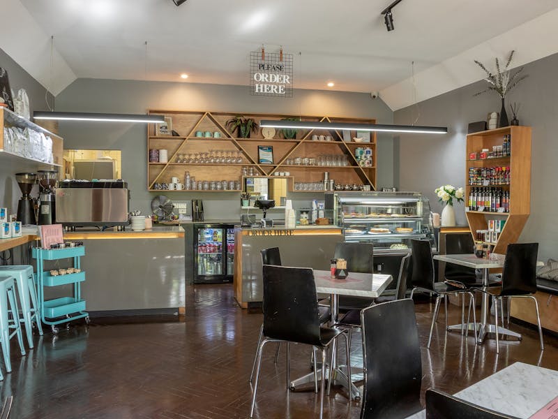 Inside Breakout Brasserie Cafe showing their cakes and coffee