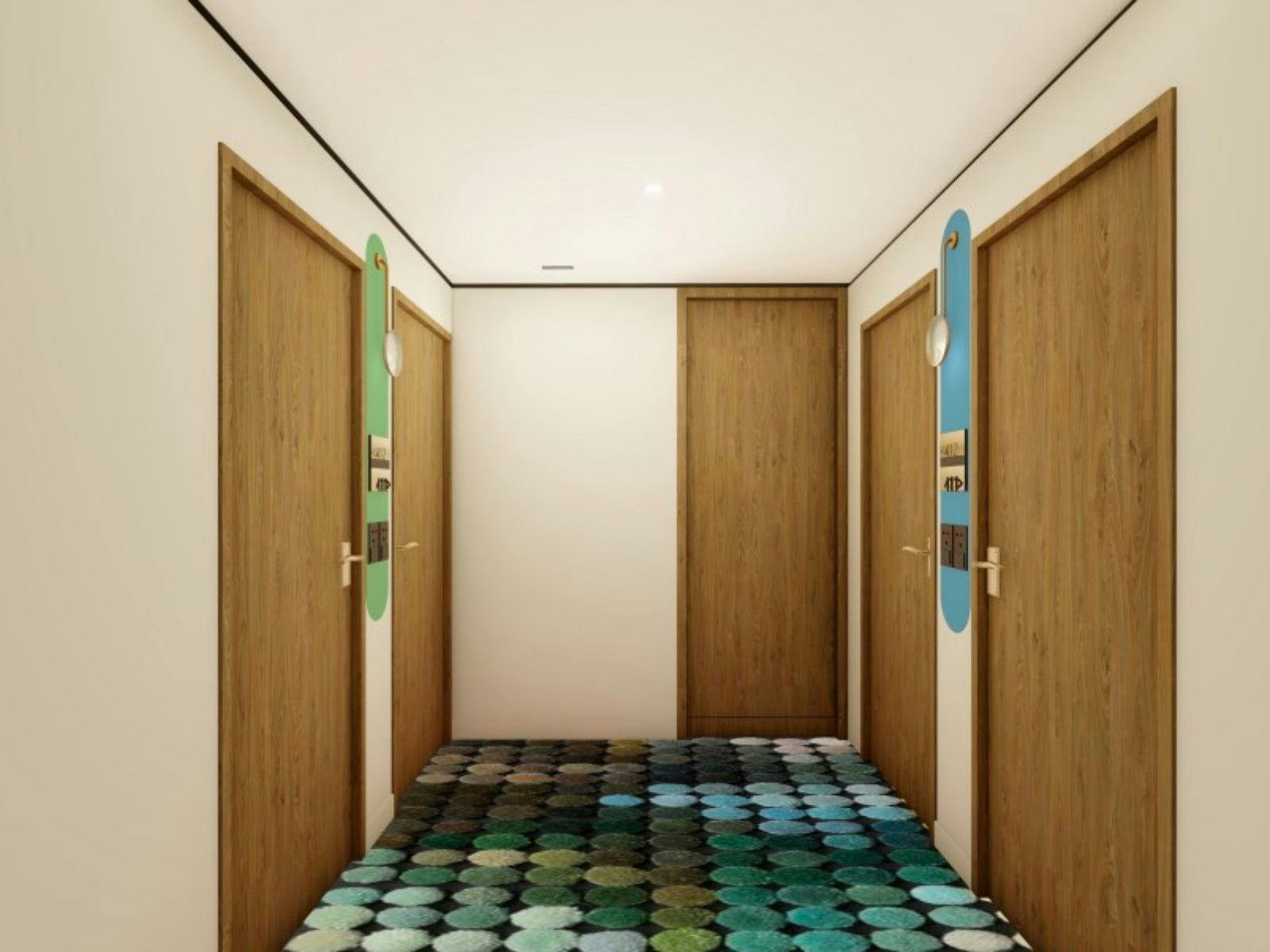 クラレンス ホテル シドニーの明るいカーペットがホールを明るくする