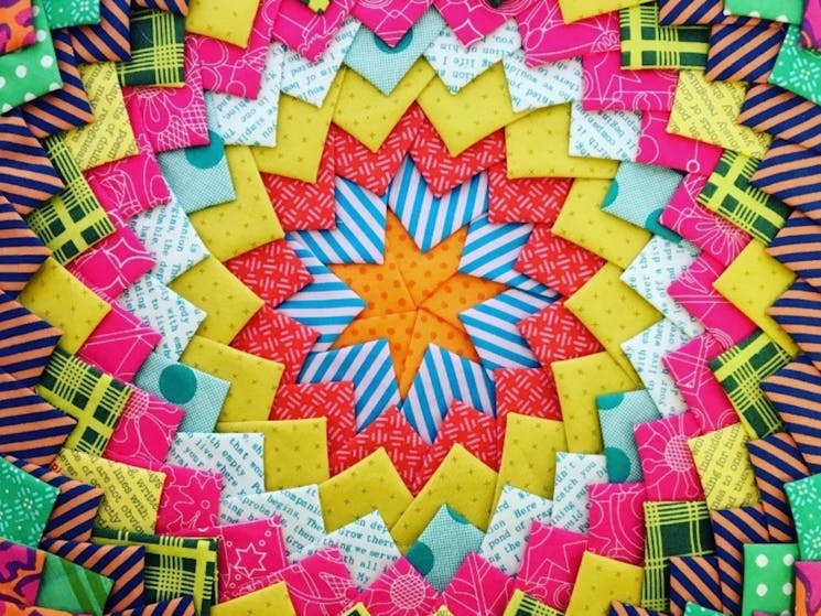 Colourful triangles arranged in layered circles