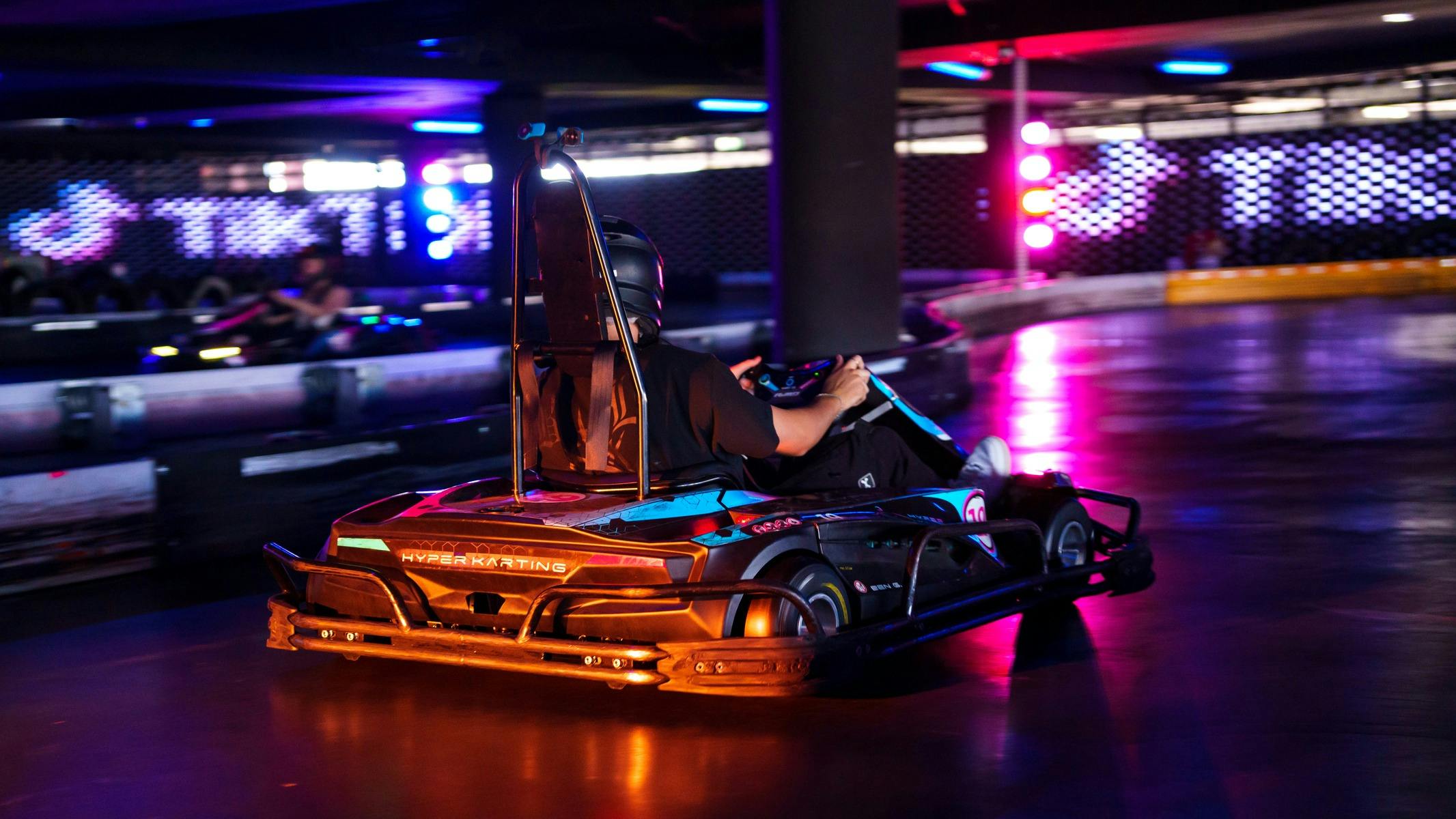 Electric Go kart racing on indoor track