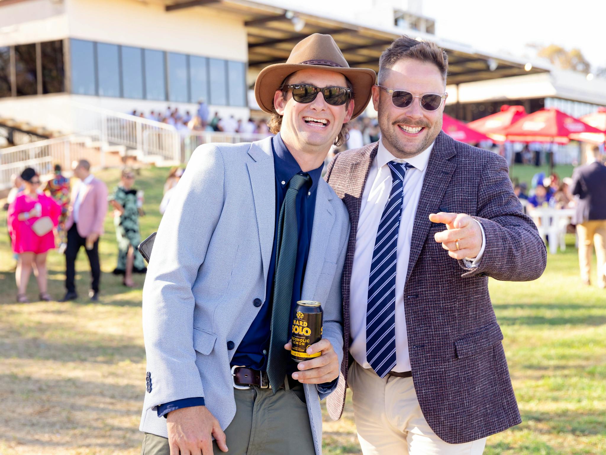 men enjoying the races