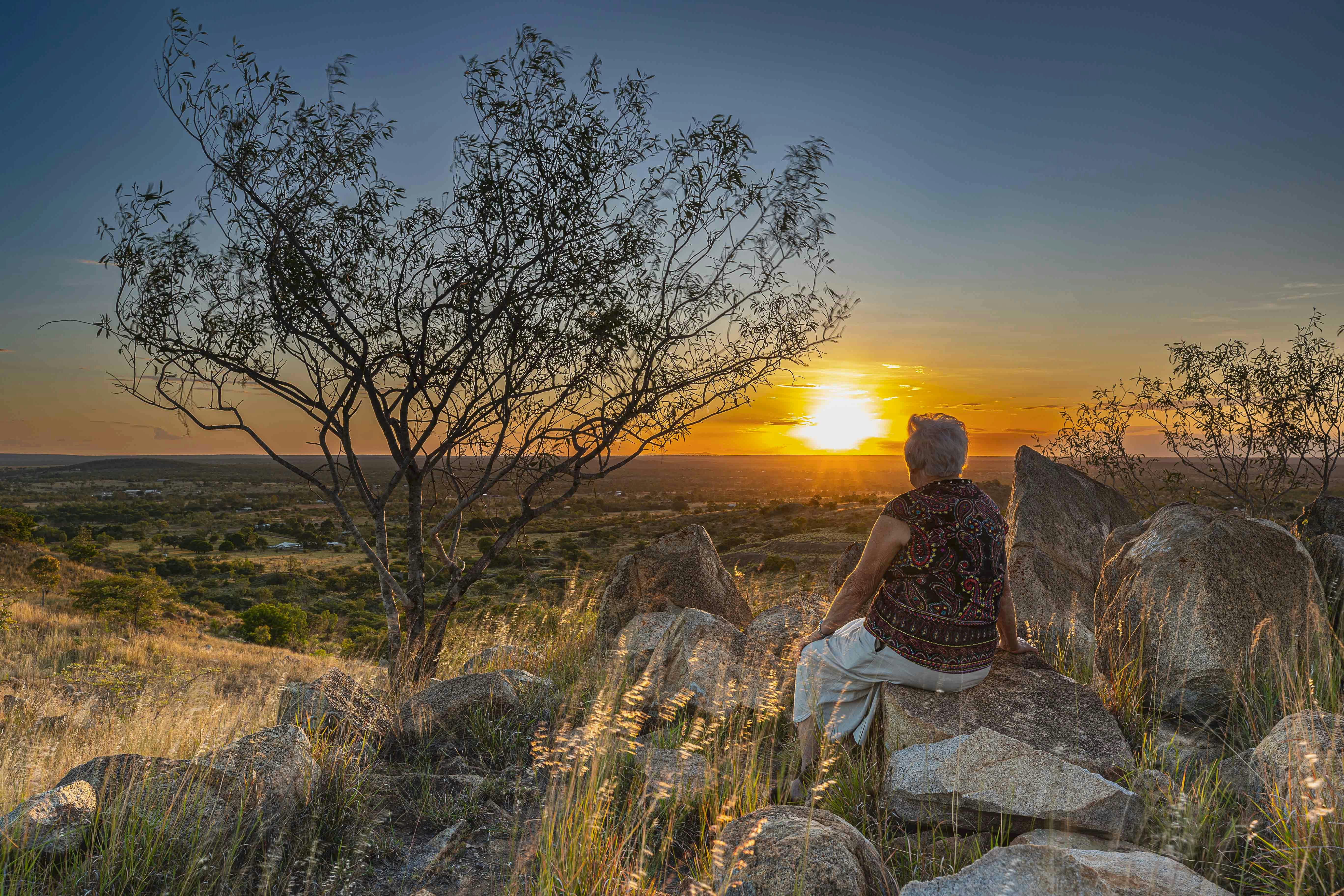 woman enjoying Sunset Towers Hill