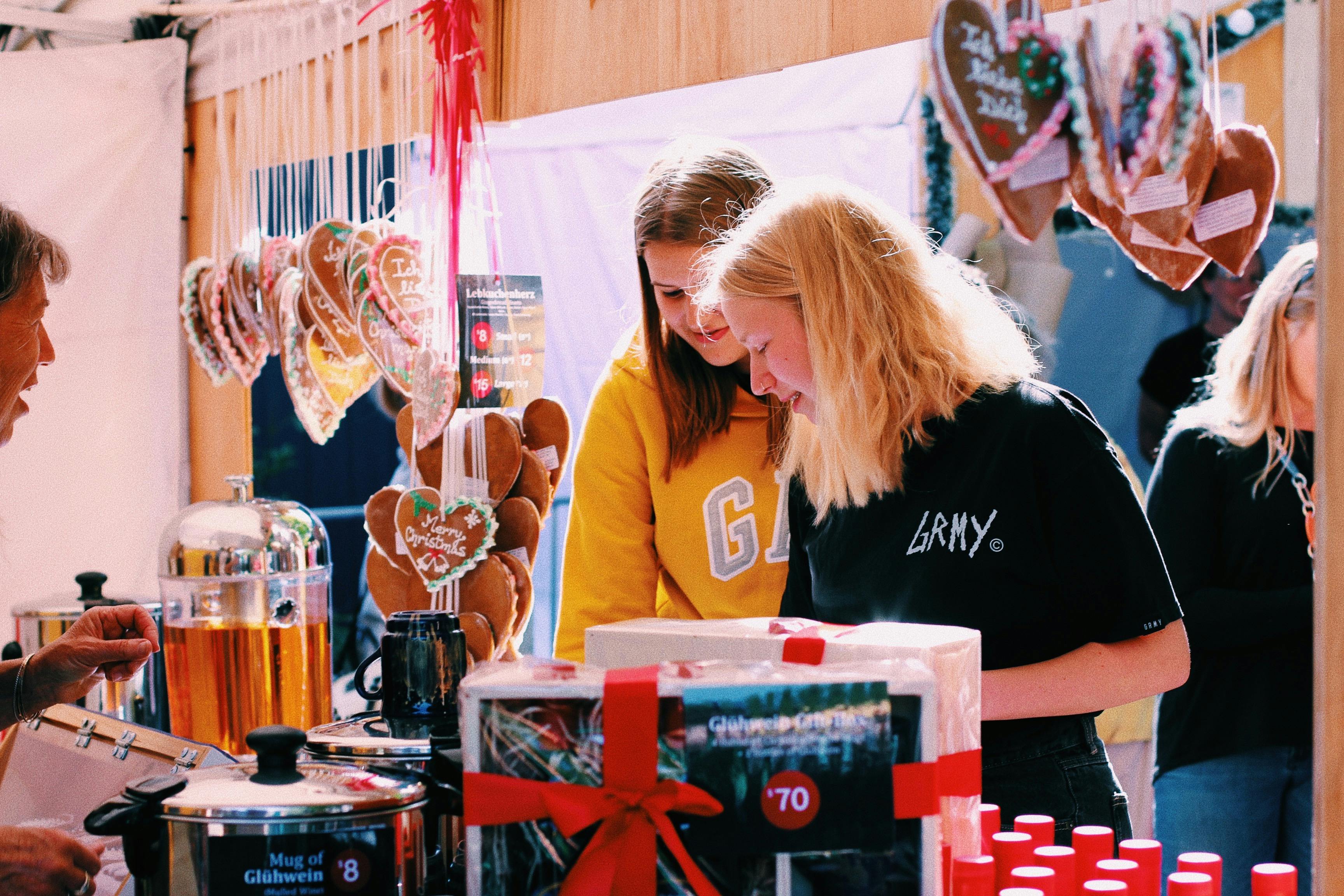 Market goers shopping at one of the stalls