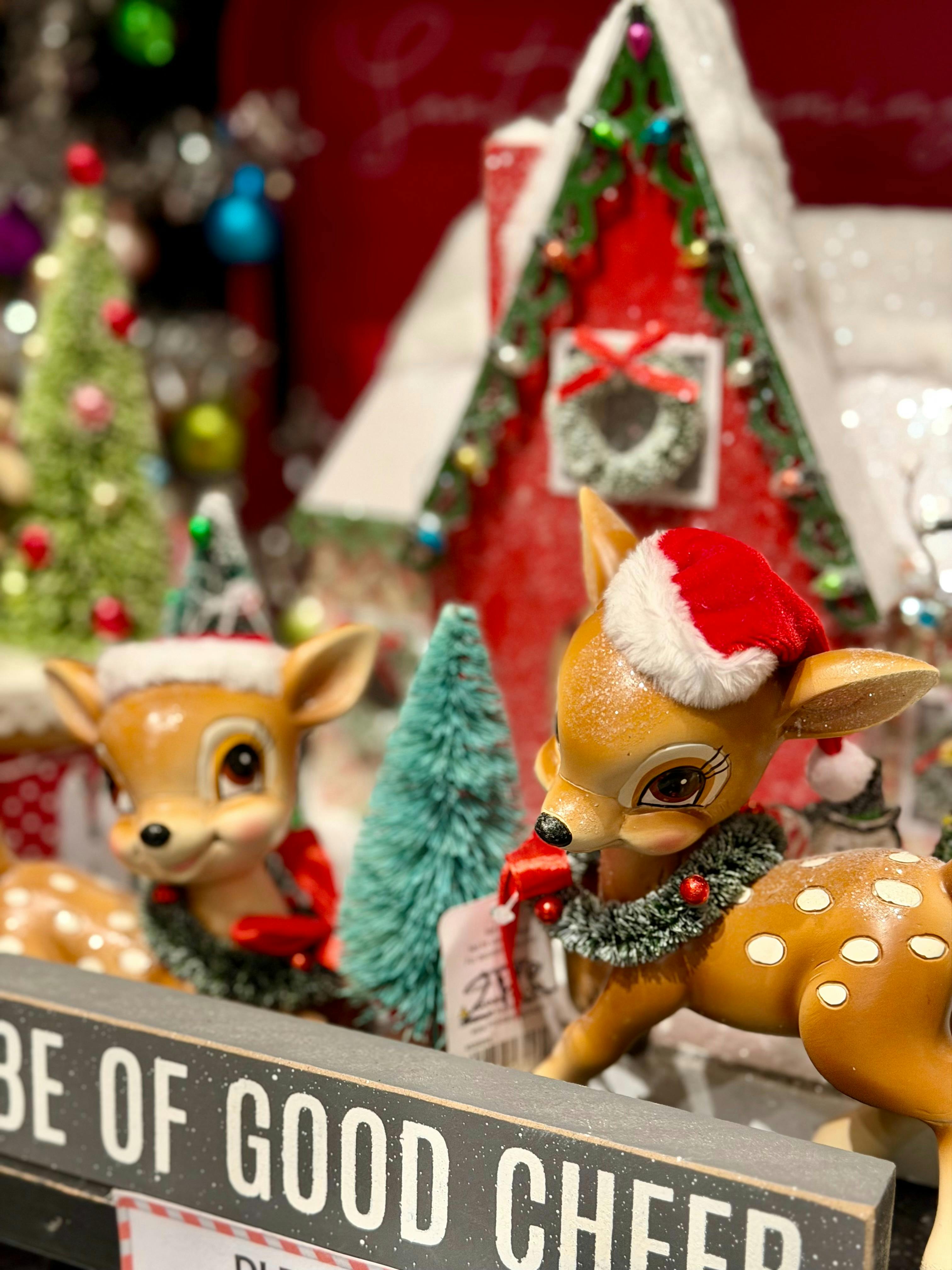 Two vintage style deer with wreath on necks