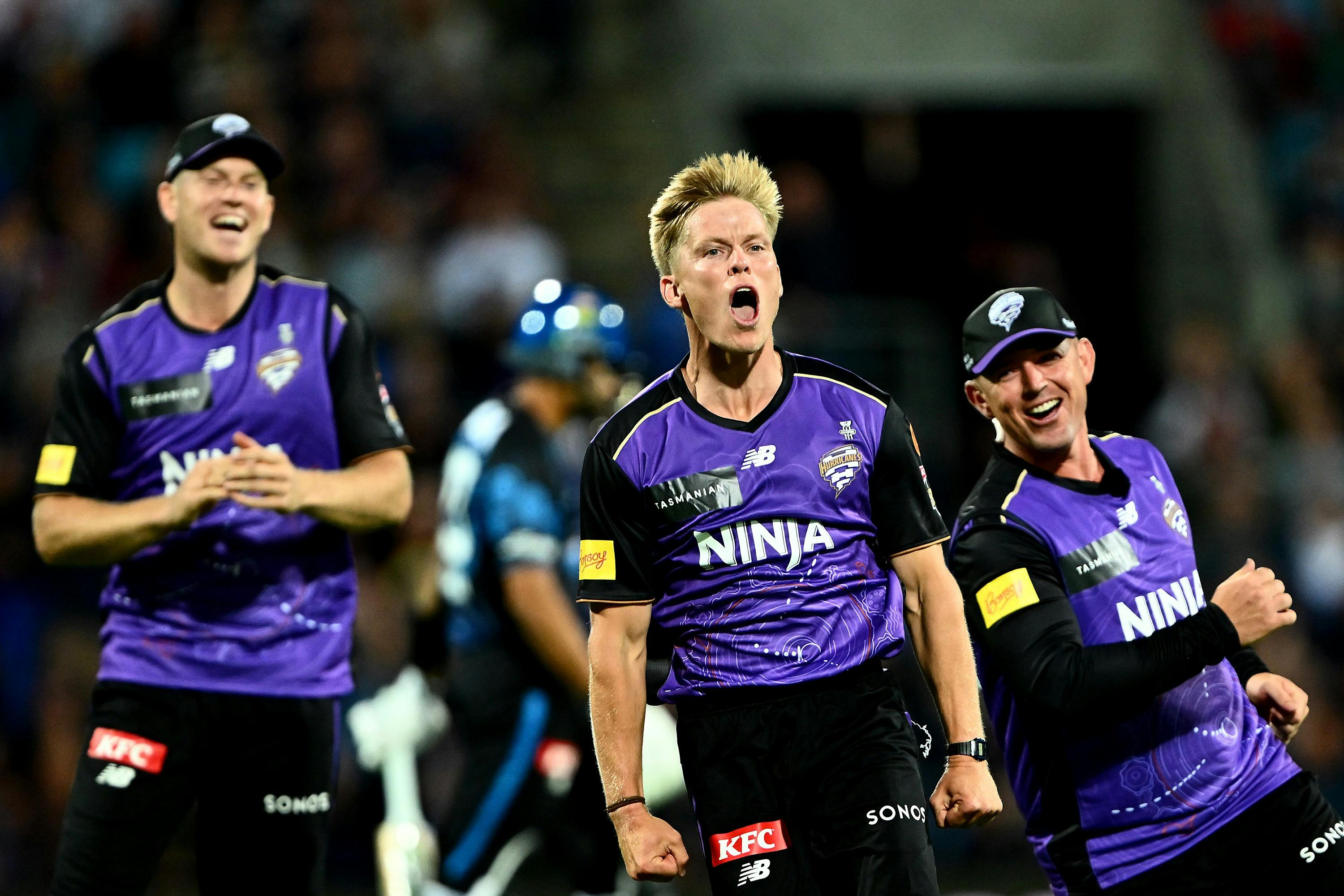 Players celebrating after a wicket is taken