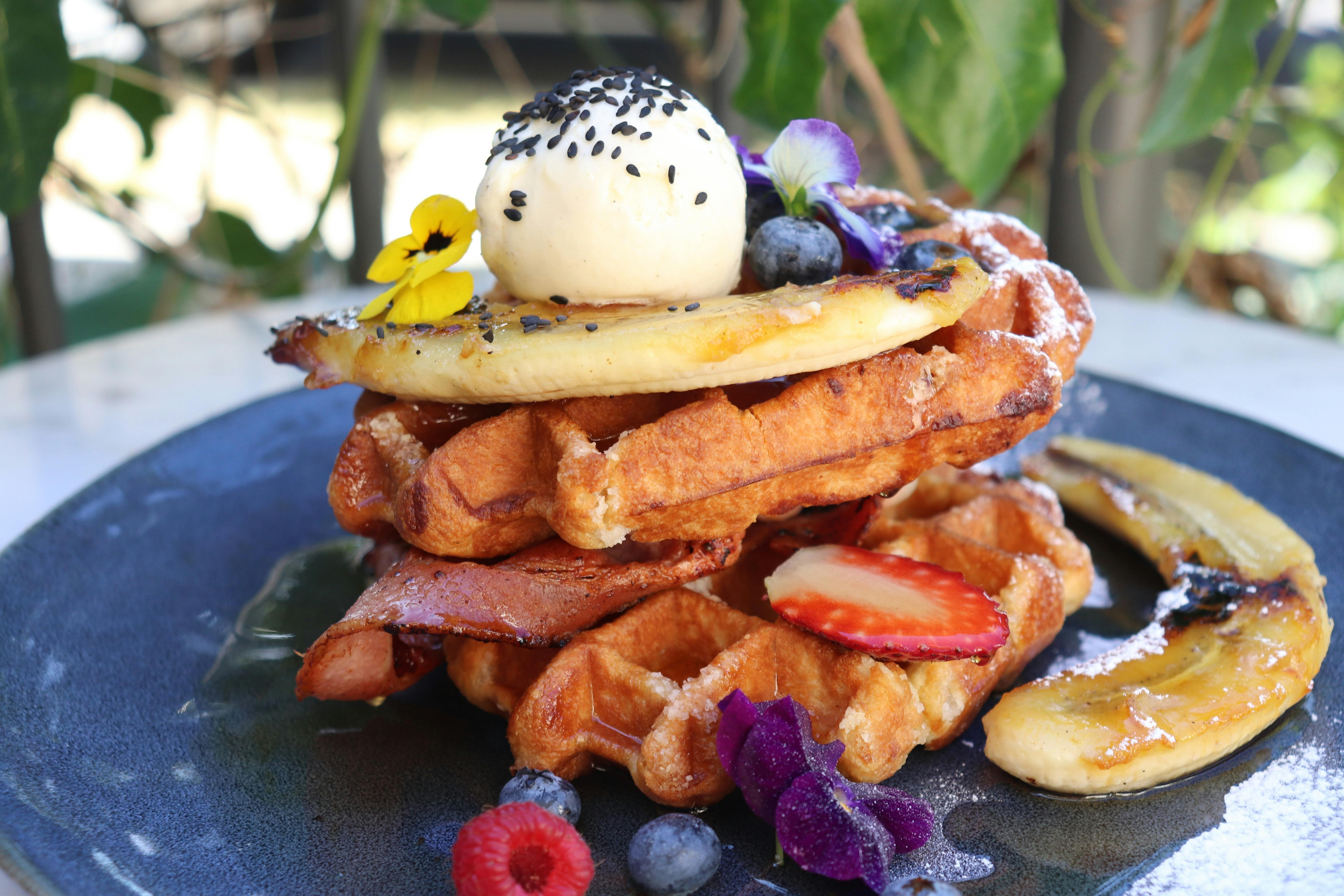 The Pantry's delicious waffles and bacon, banana, ice-cream and maple syrup