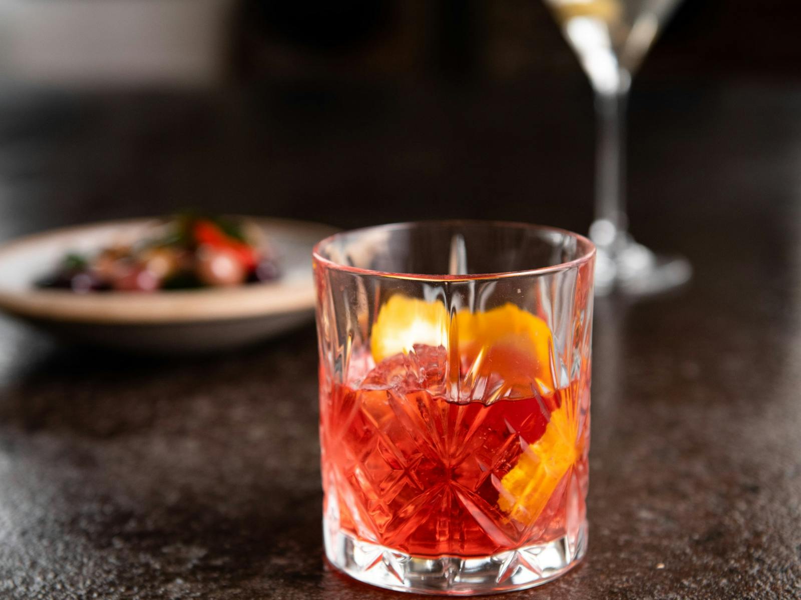 We have an expansive cocktail, spirit and wine list available. Featured here is the popular Negroni.