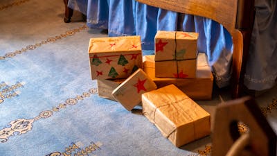 Christmas presents on display in bedroom at Calthorpes House