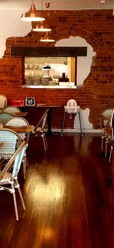 Our dining space has 30 seats, a lovely mixture of warm timber and Indonesian decorations